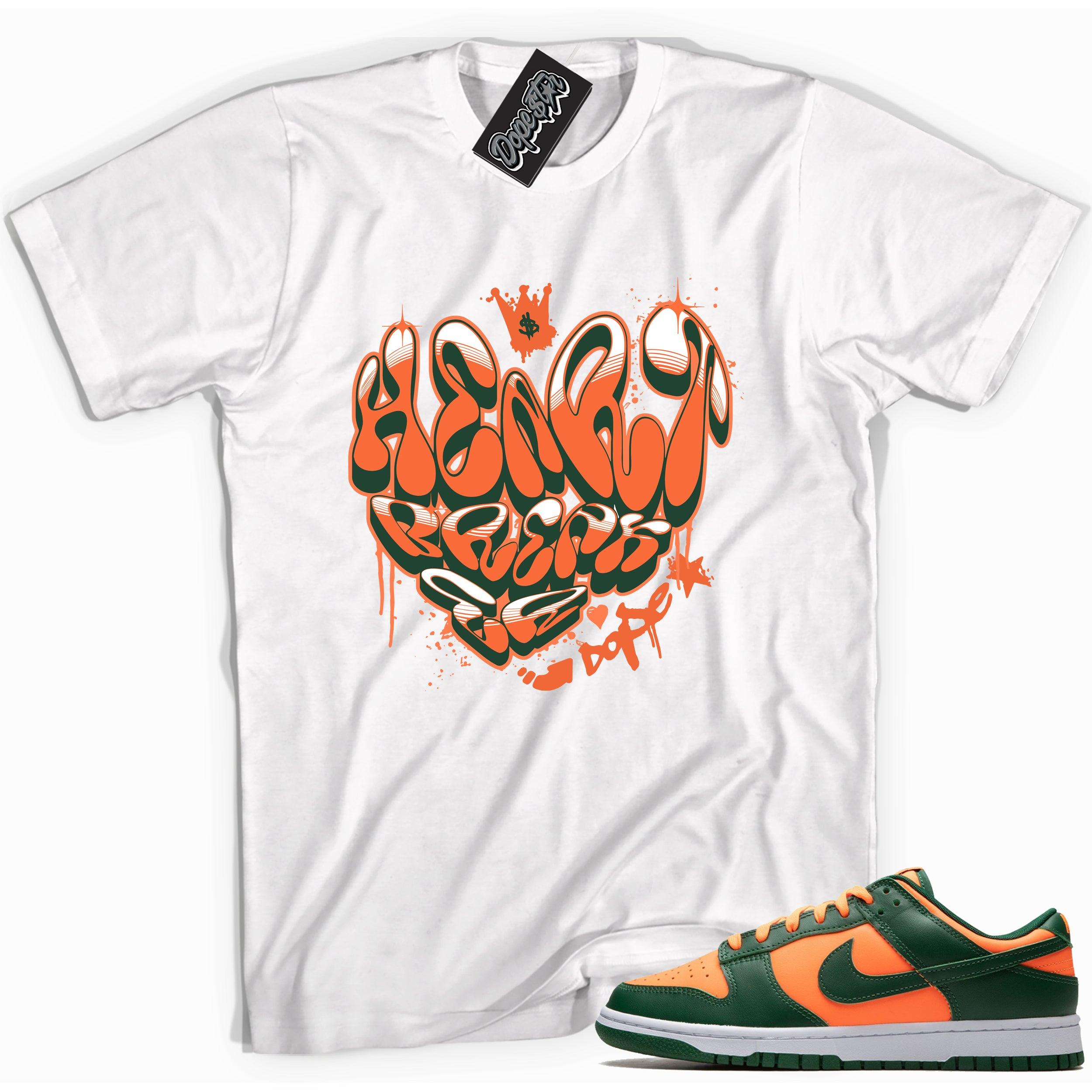 Cool White graphic tee with “ Heartbreaker ” print, that perfectly matches Nike Dunk Low Retro Miami Hurricanes sneakers 