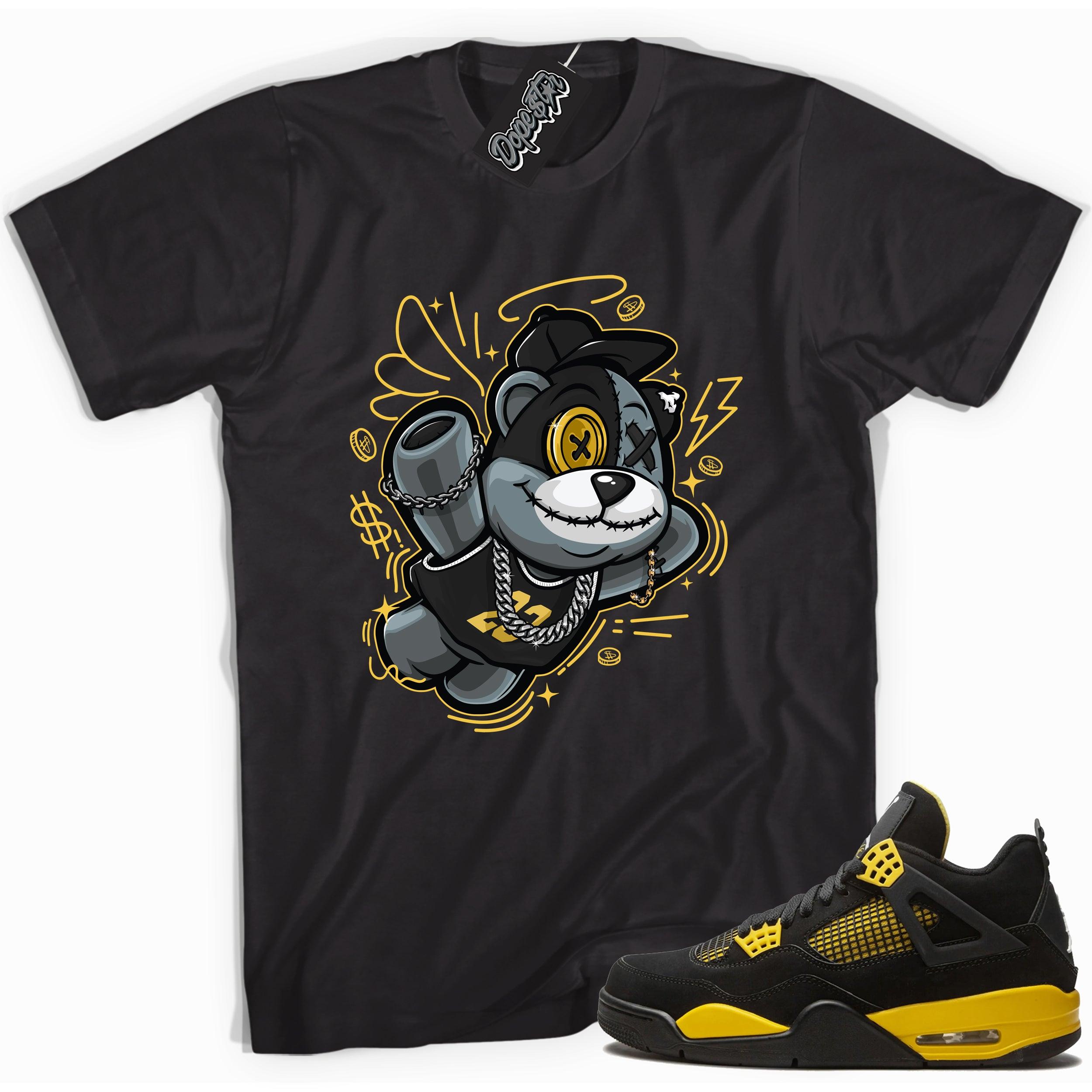 Cool black graphic tee with 'slam dunk bear' print, that perfectly matches Air Jordan 4 Thunder sneakers