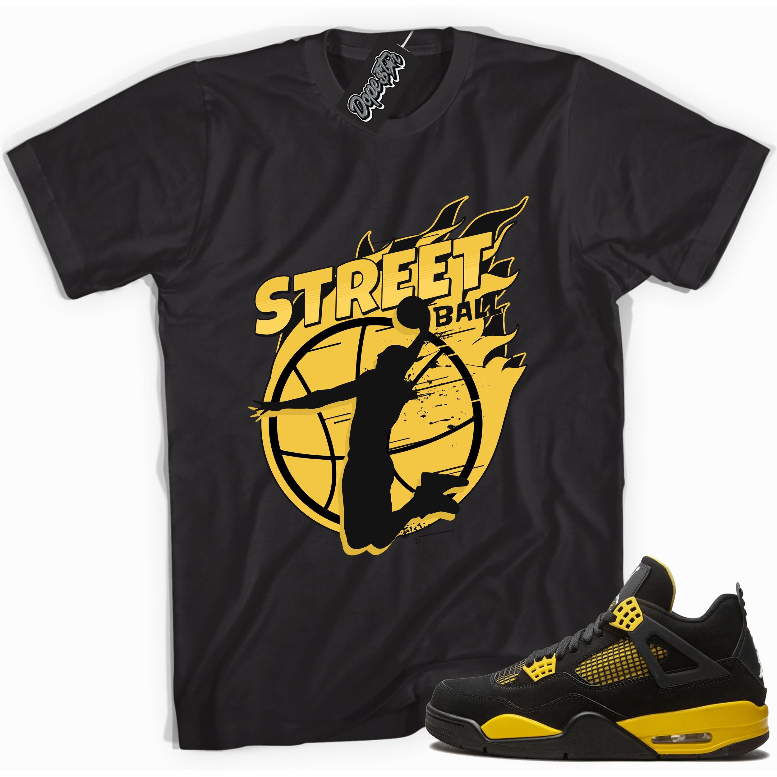 Cool black graphic tee with 'street ball' print, that perfectly matches Air Jordan 4 Thunder sneakers