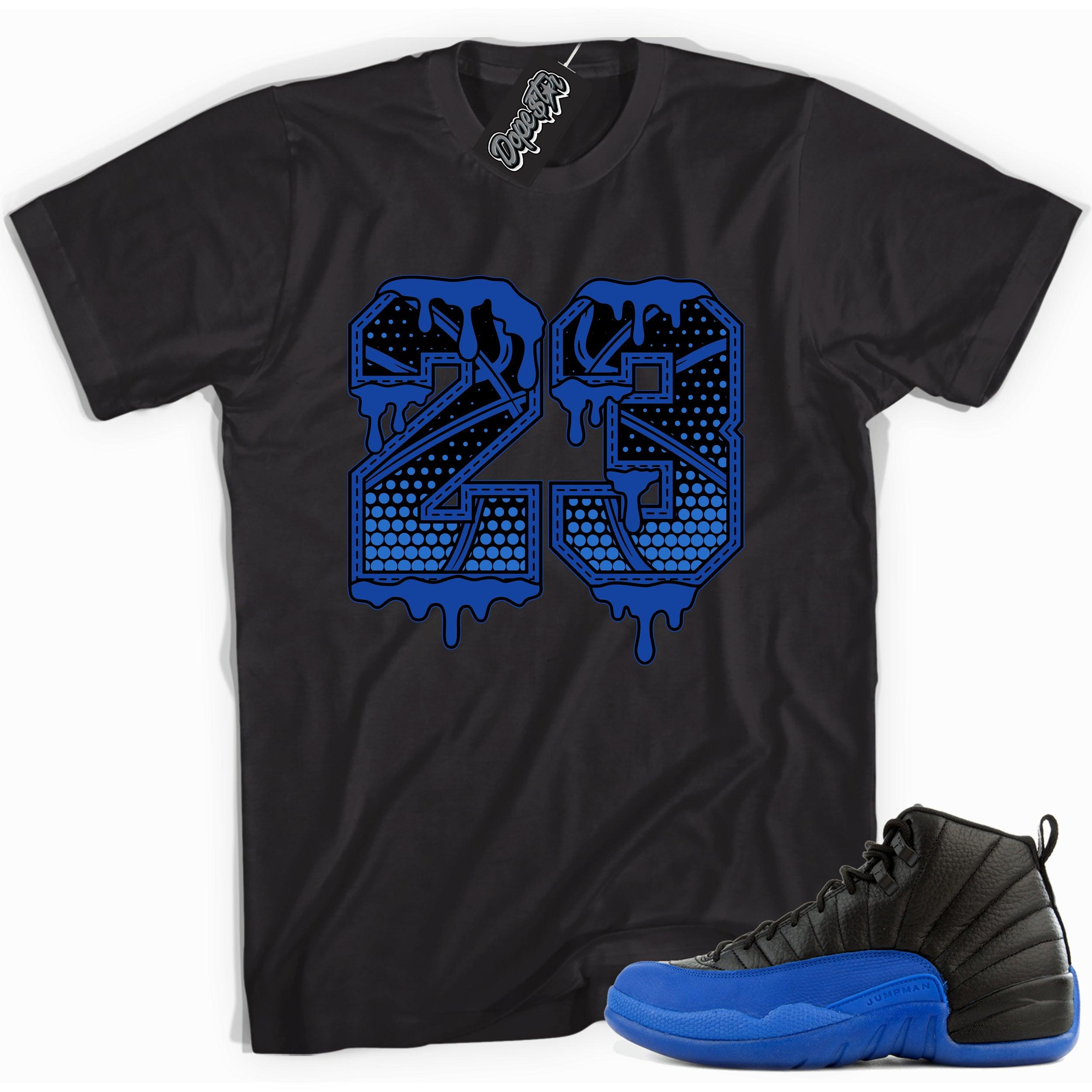 Cool black graphic tee with '23 basketball' print, that perfectly matches  Air Jordan 12 Retro Black Game Royal sneakers.