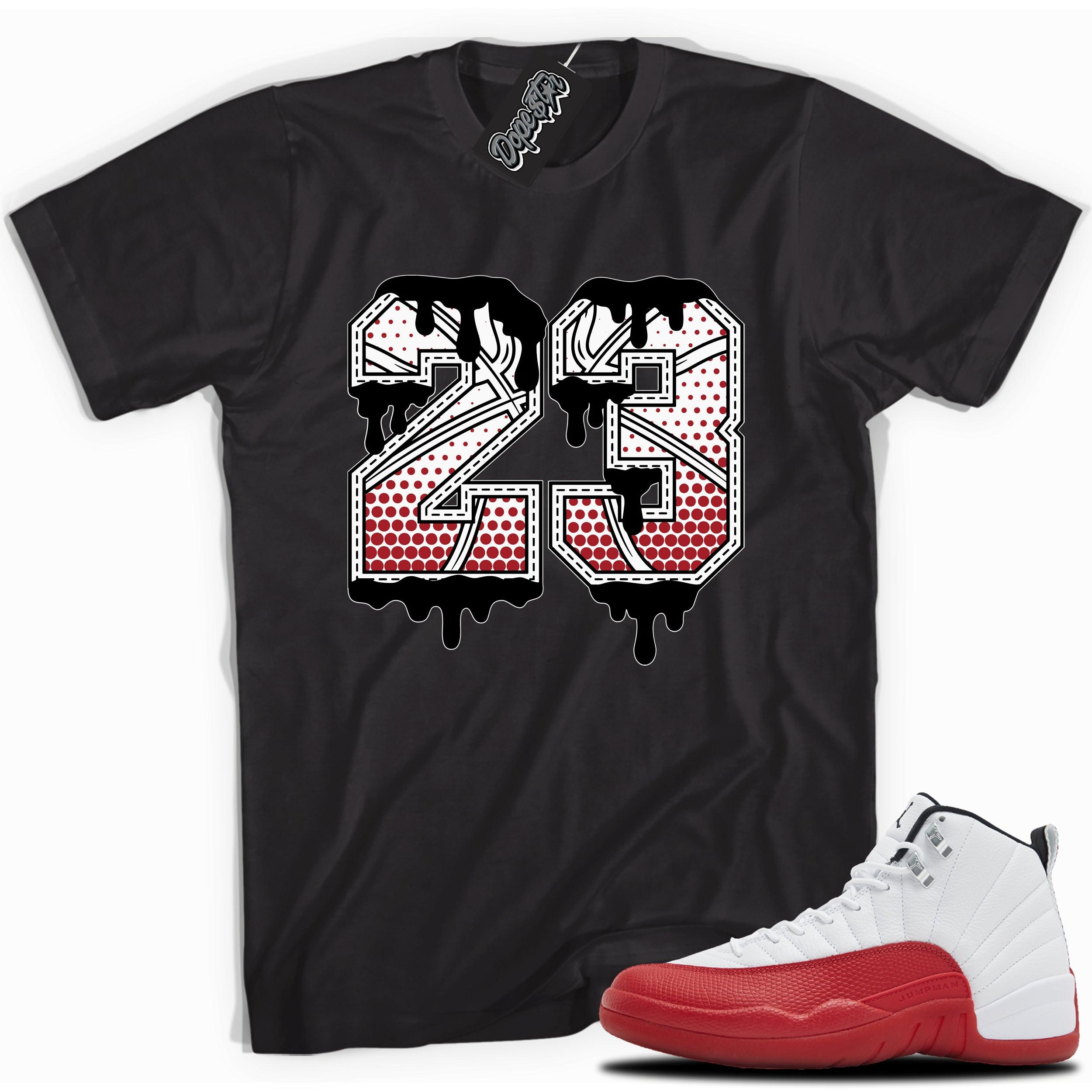 Cool Black graphic tee with “ 23 Ball ” print, that perfectly matches Air Jordan 12 Retro Cherry Red 2023 red and white sneakers 