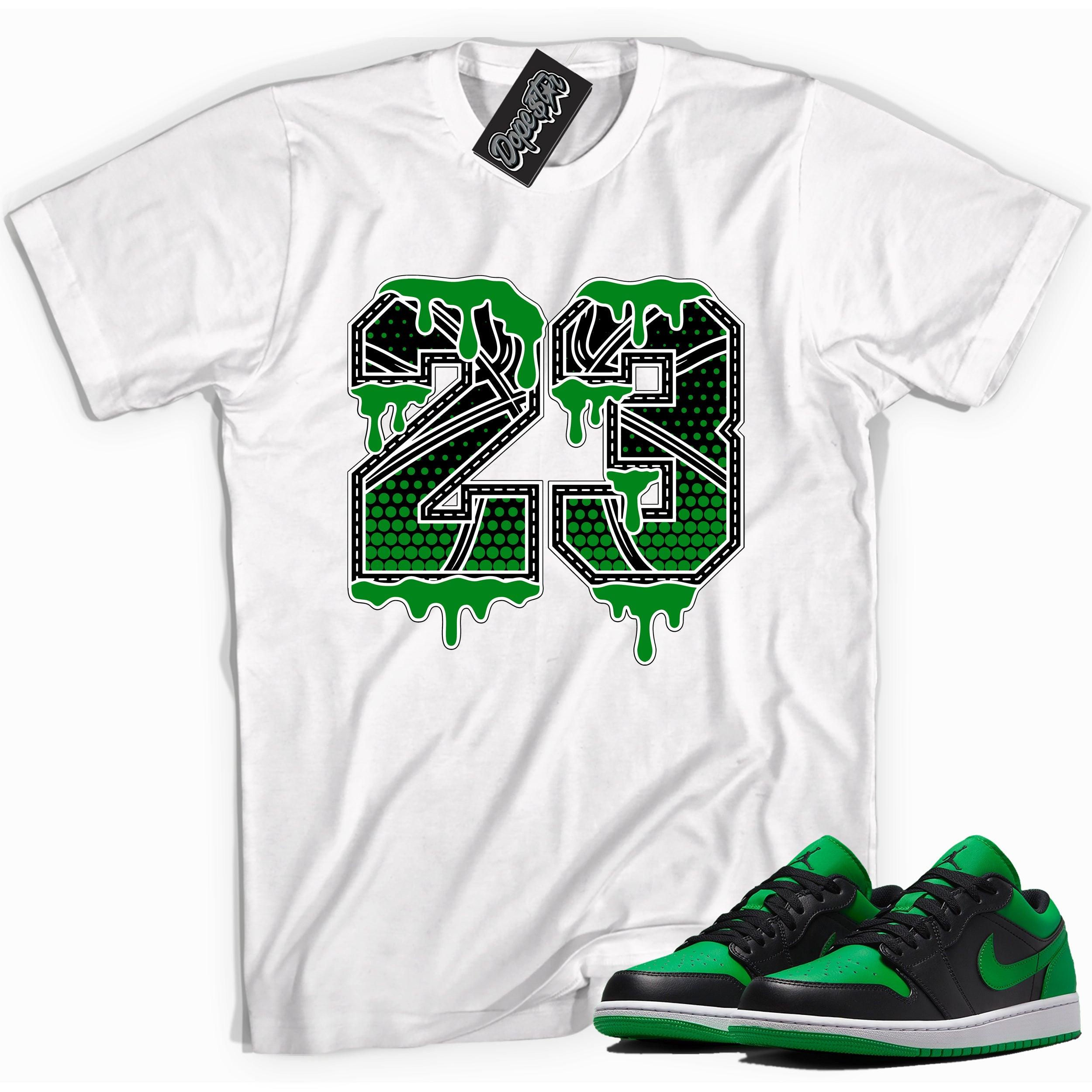 Cool white graphic tee with '23 BasketBall' print, that perfectly matches Air Jordan 1 Low Lucky Green sneakers