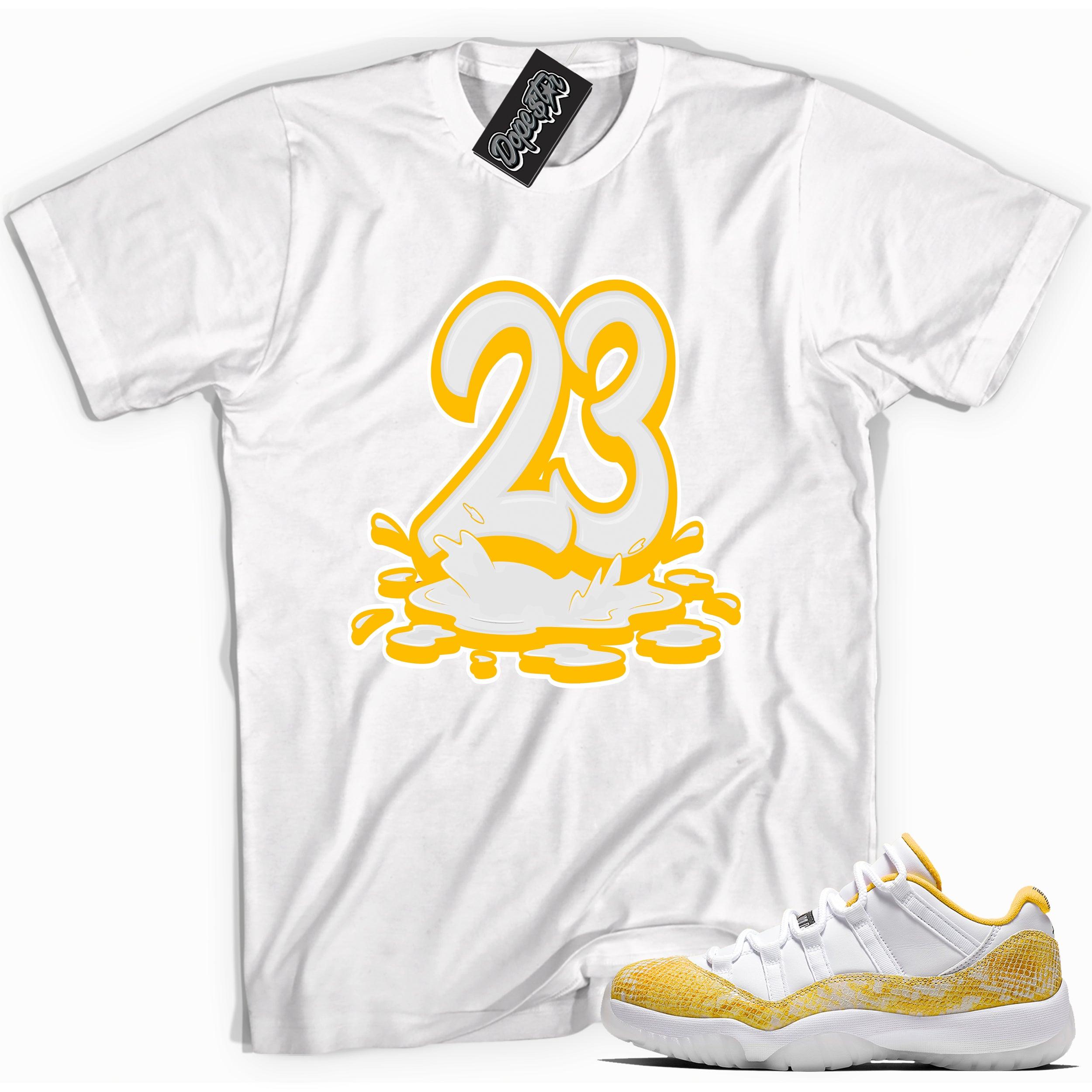Cool white graphic tee with '23 melting' print, that perfectly matches Air Jordan 11 Low Yellow Snakeskin sneakers