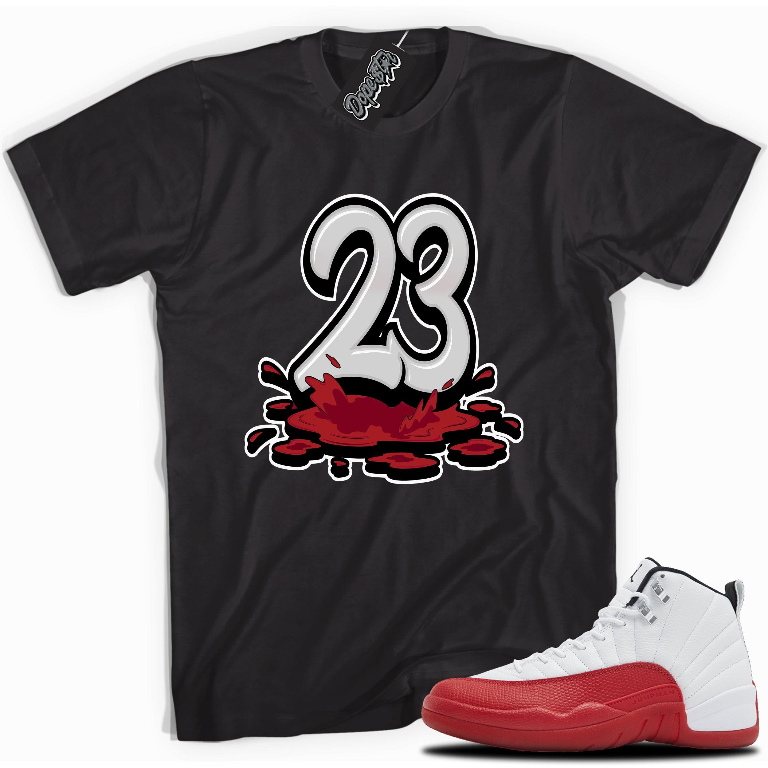Cool Black graphic tee with “ 23 Melting ” print, that perfectly matches Air Jordan 12 Retro Cherry Red 2023 red and white sneakers
