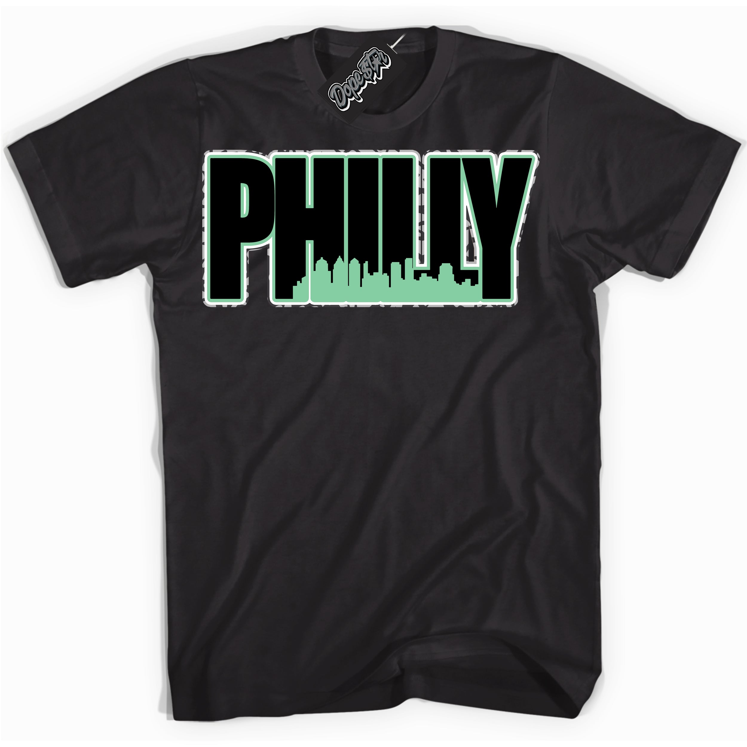 Cool White graphic tee with “ Philly ” design, that perfectly matches Green Glow 3s sneakers 