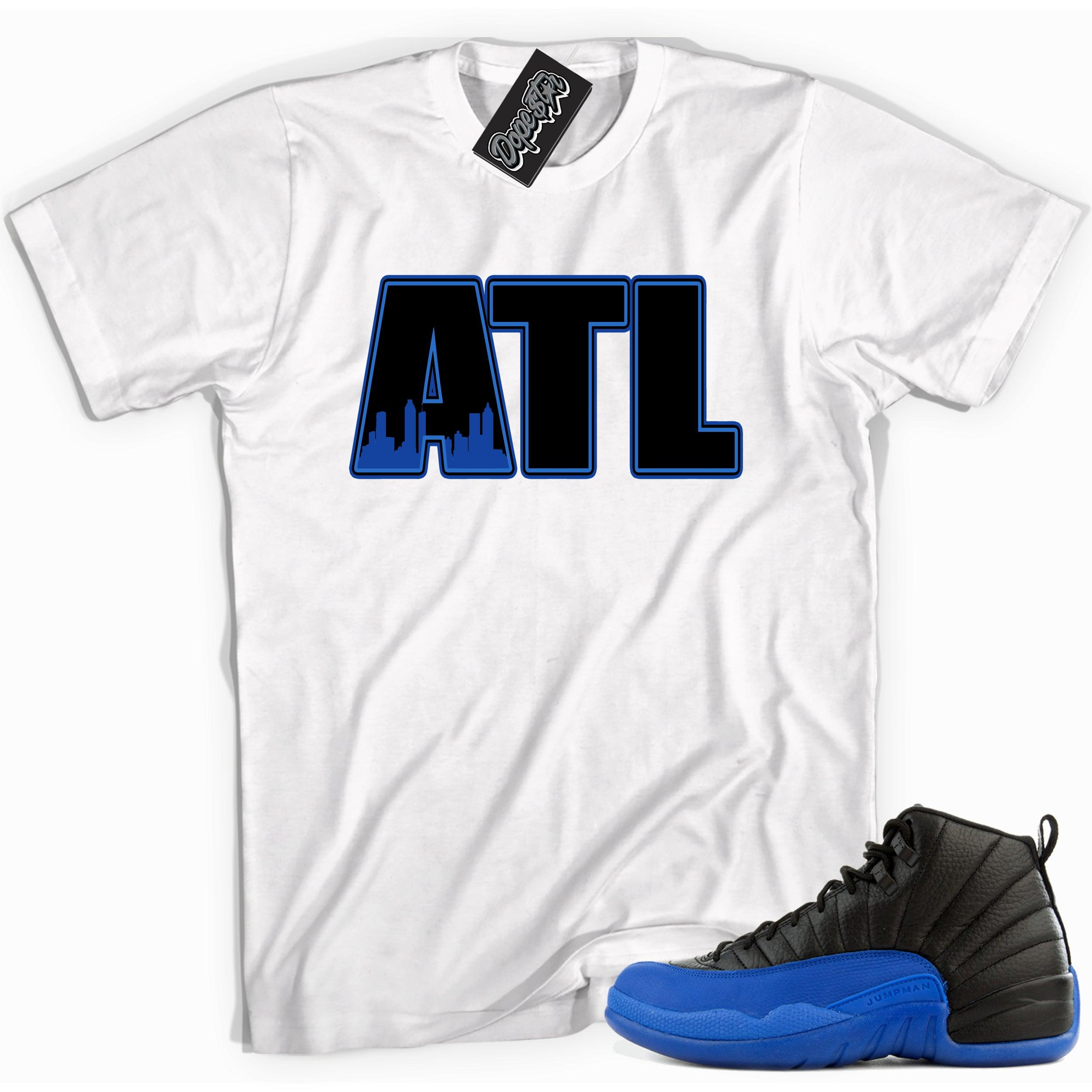 Cool white graphic tee with 'ATL' print, that perfectly matches Air Jordan 12 Retro Black Game Royal sneakers.