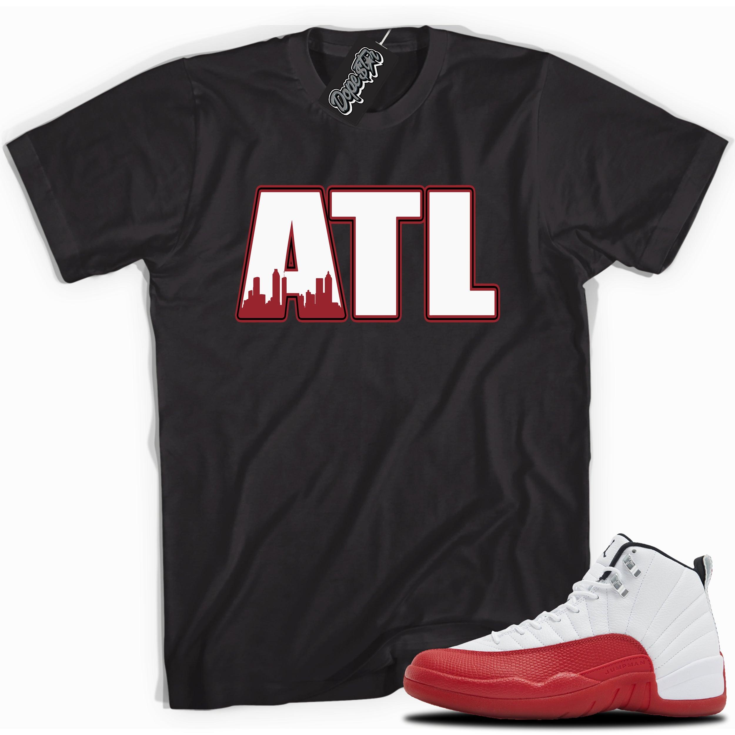 Cool Black graphic tee with “ ATLANTA ” print, that perfectly matches Air Jordan 12 Retro Cherry Red 2023 red and white sneakers 