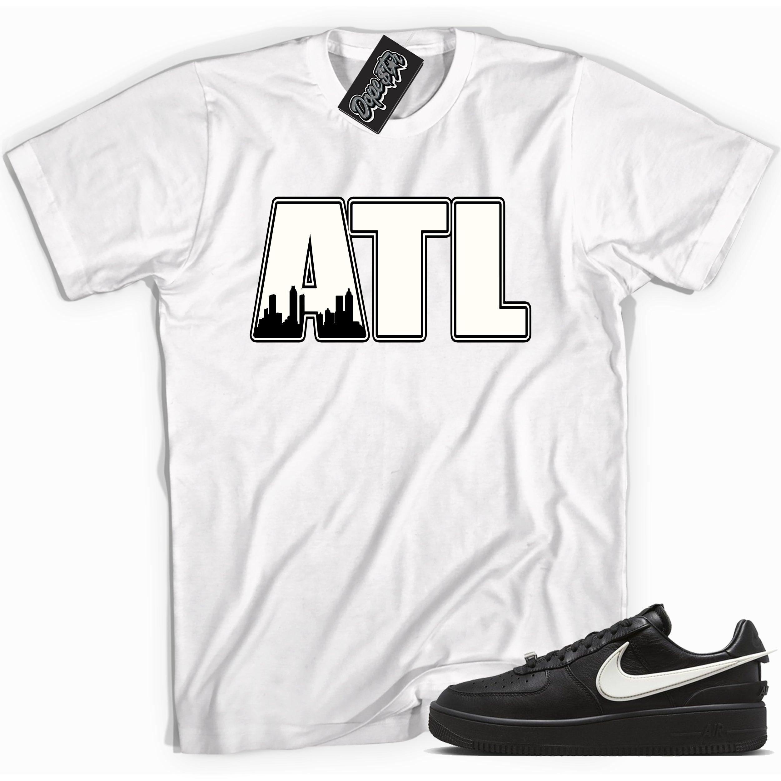 Cool white graphic tee with 'Atlanta ATL' print, that perfectly matches Nike Air Force 1 Low SP Ambush Phantom sneakers.