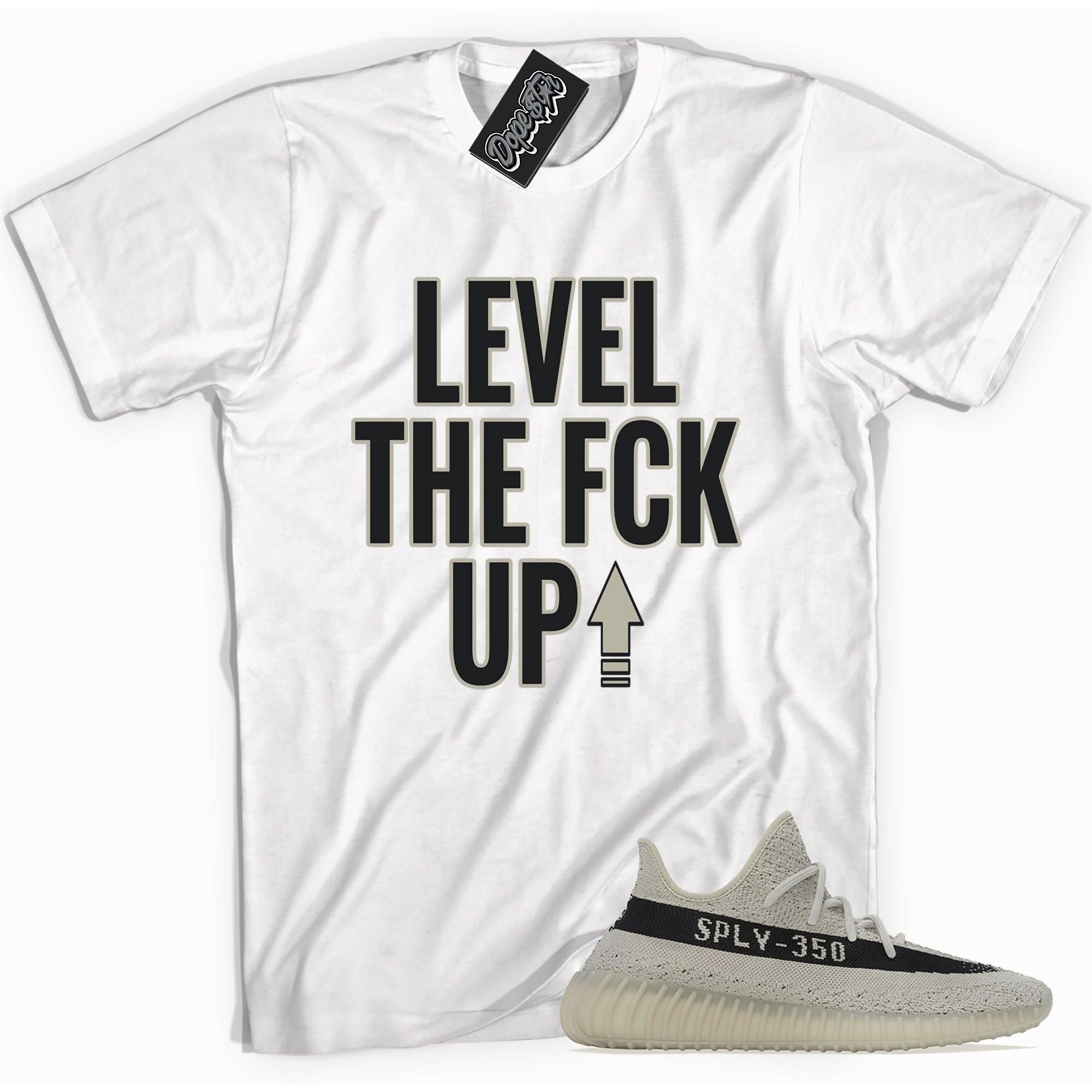 Cool white graphic tee with 'Level Up' print, that perfectly matches Adidas Yeezy Boost 350 V2 Slate sneakers.