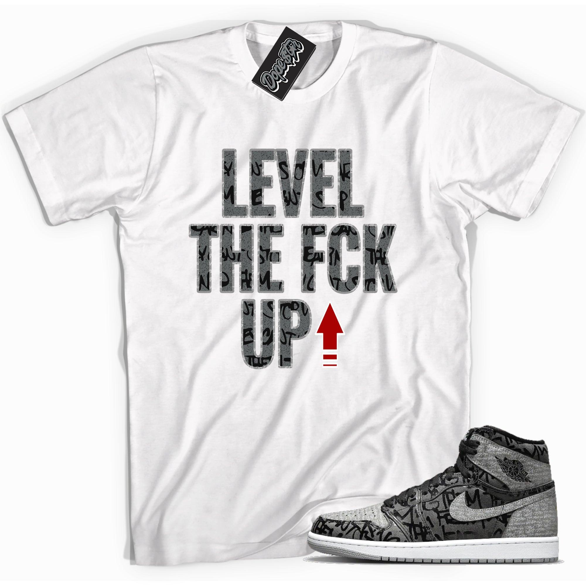 Cool white graphic tee with 'level up' print, that perfectly matches Air Jordan 1 High OG Rebellionaire sneakers.