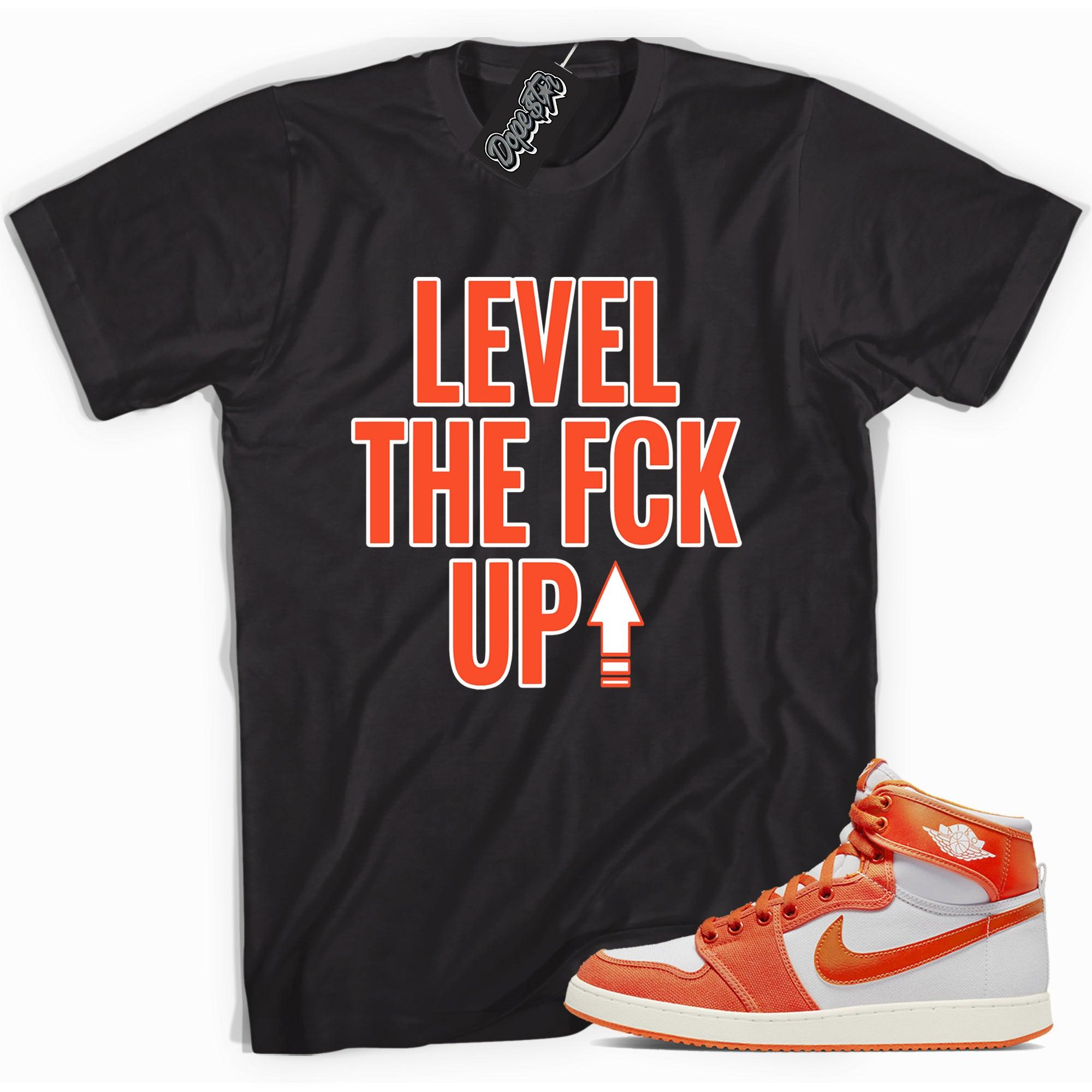 Cool black graphic tee with 'Level Up' print, that perfectly matches Air Jordan 1 KO syracuse sneakers.