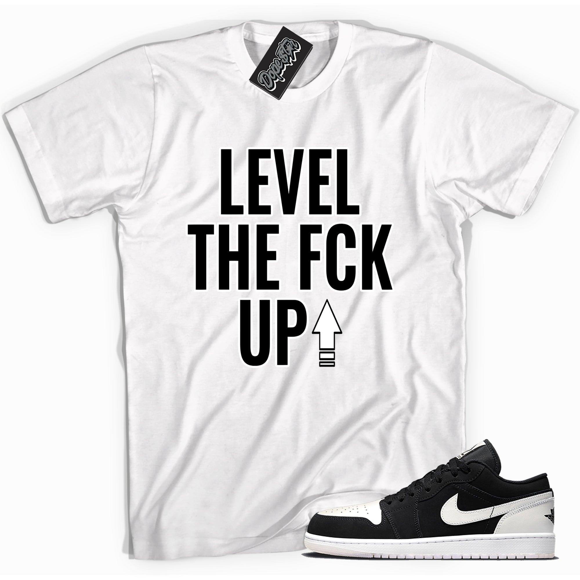 Cool white graphic tee with 'level up' print, that perfectly matches Air Jordan 1 Low Diamond sneakers.
