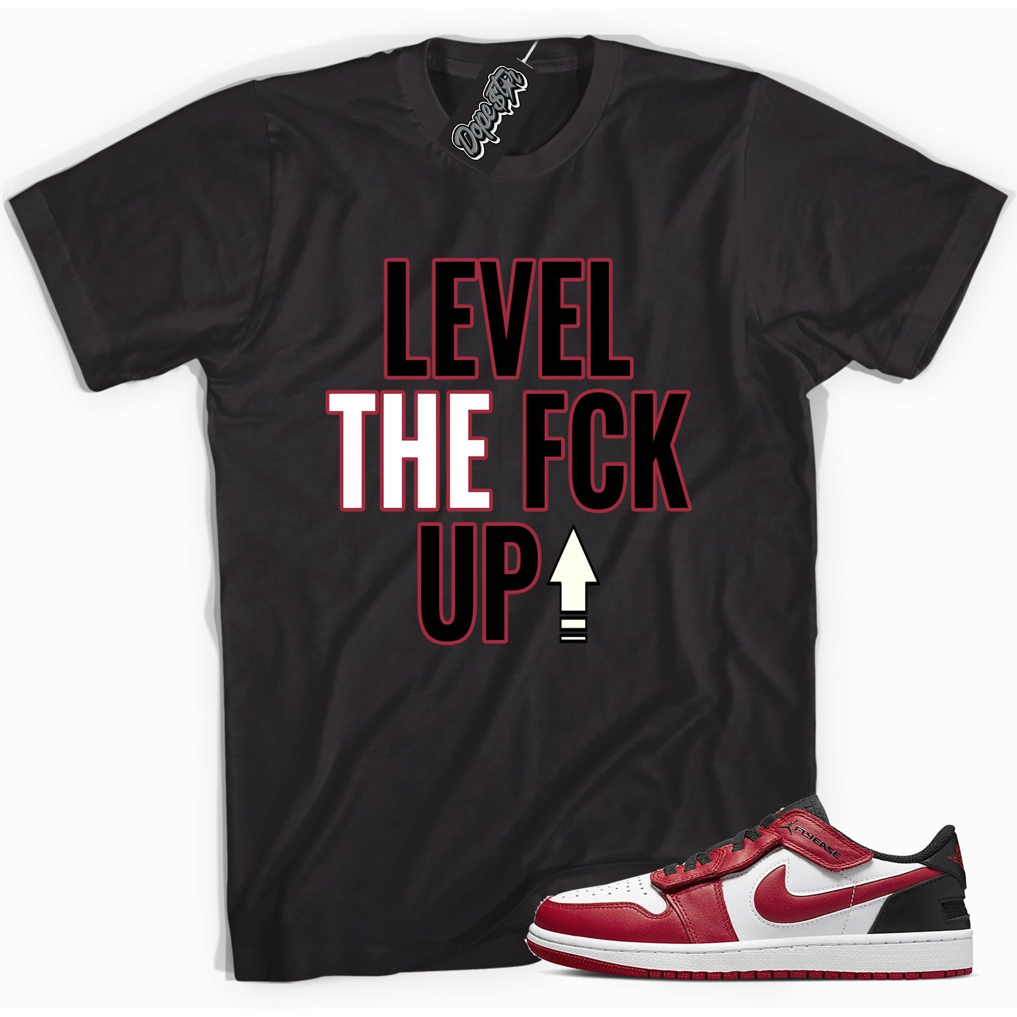 Cool black graphic tee with 'Level Up' print, that perfectly matches Air Jordan 1 Low FlyEase sneakers.