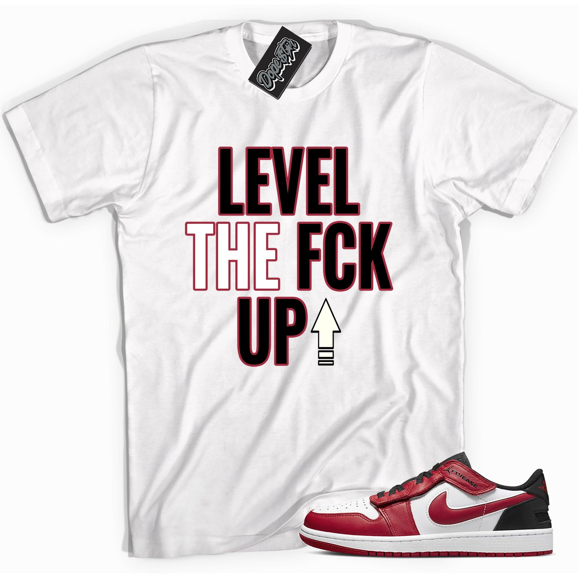 Cool white graphic tee with 'Level Up' print, that perfectly matches Air Jordan 1 Low FlyEase sneakers.