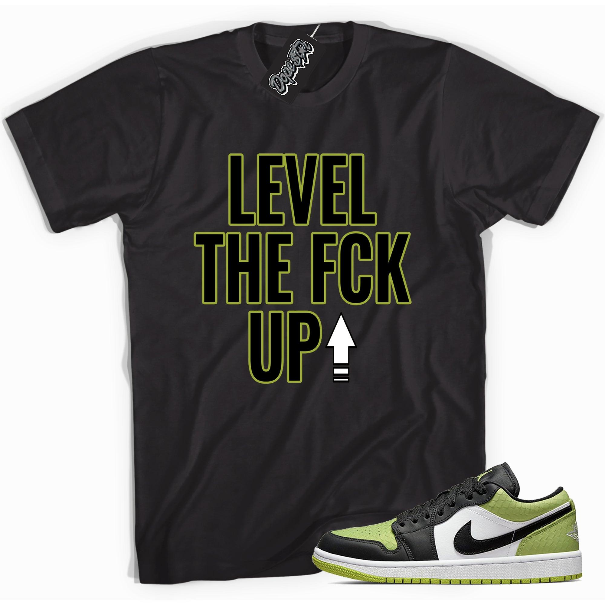 Cool black graphic tee with 'Level Up' print, that perfectly matches Air Jordan 1 Low Snakeskin Vivid Green sneakers.