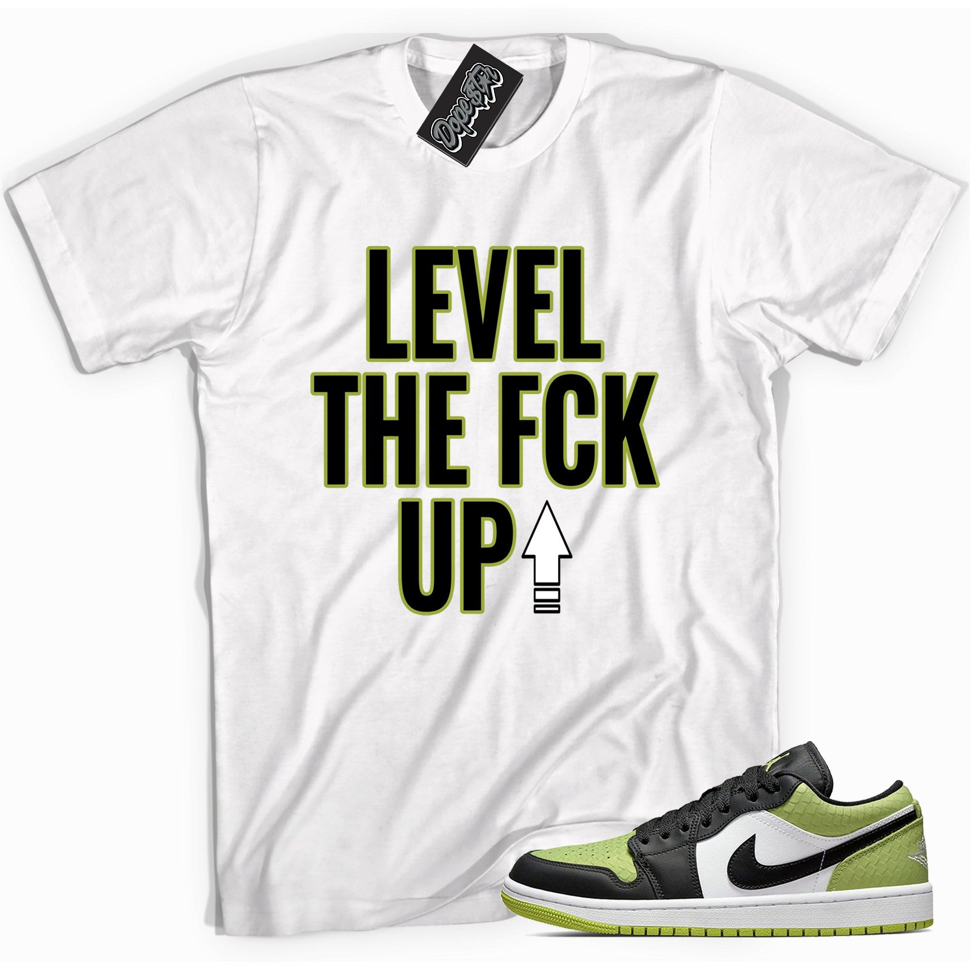 Cool white graphic tee with 'Level Up' print, that perfectly matches Air Jordan 1 Low Snakeskin Vivid Green sneakers.