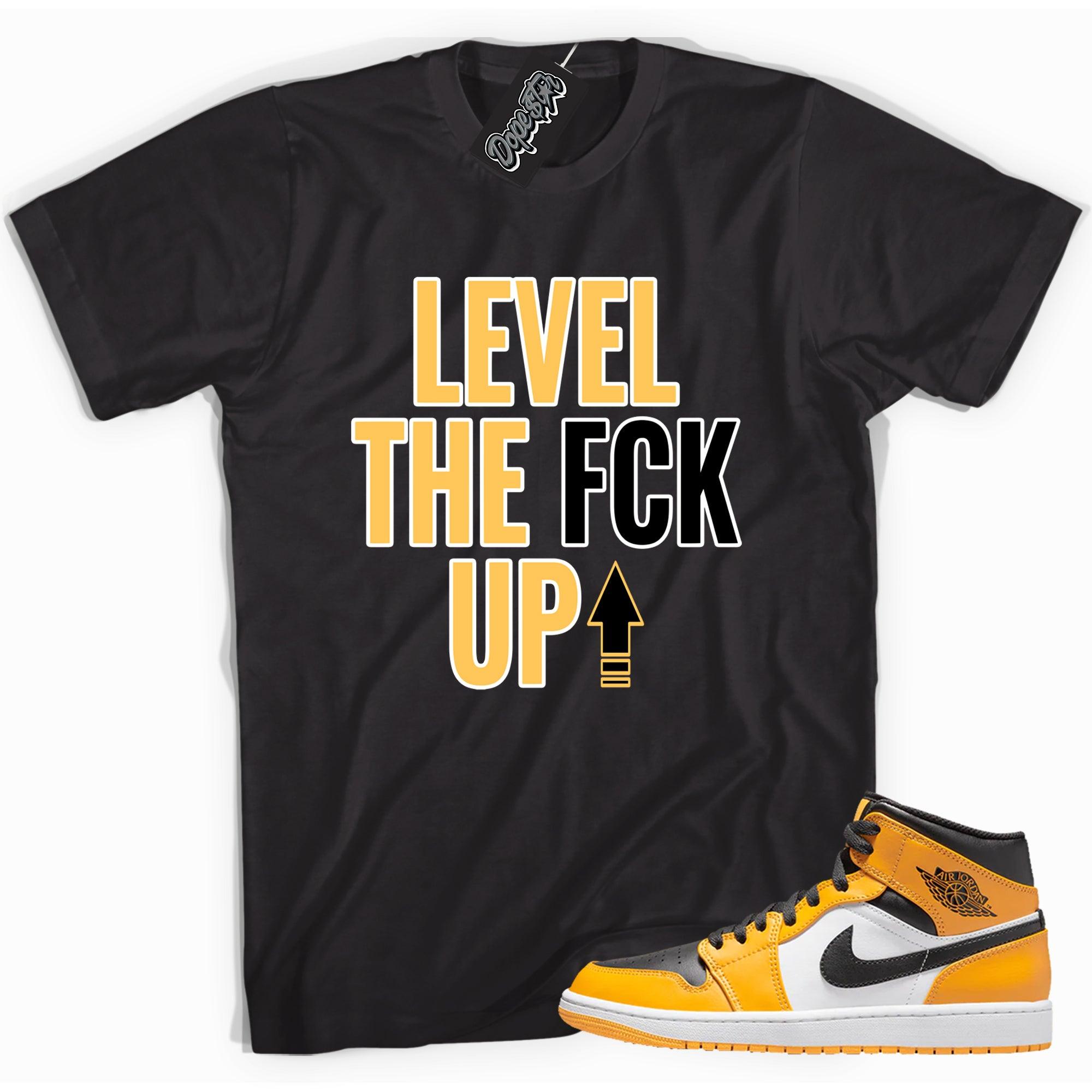 Cool black graphic tee with 'Level Up' print, that perfectly matches Air Jordan 1 MID TAXI sneakers.