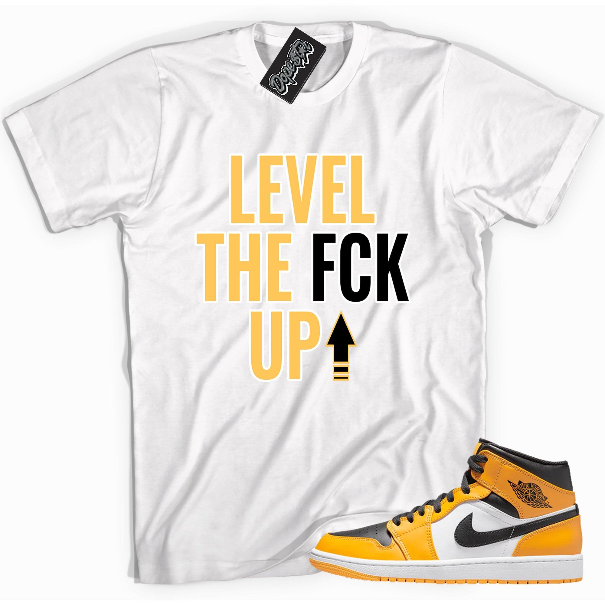 Cool white graphic tee with 'Level Up' print, that perfectly matches Air Jordan 1 MID TAXI sneakers.