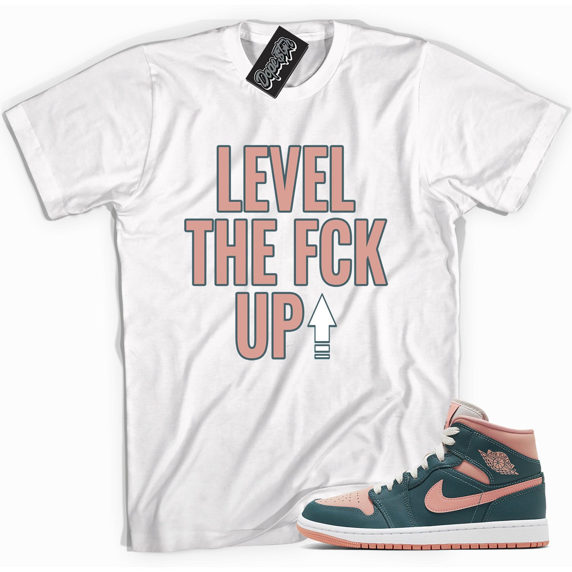Cool white graphic tee with 'Level Up' print, that perfectly matches Air Jordan 1 Mid Dark Teal Green Toe sneakers.