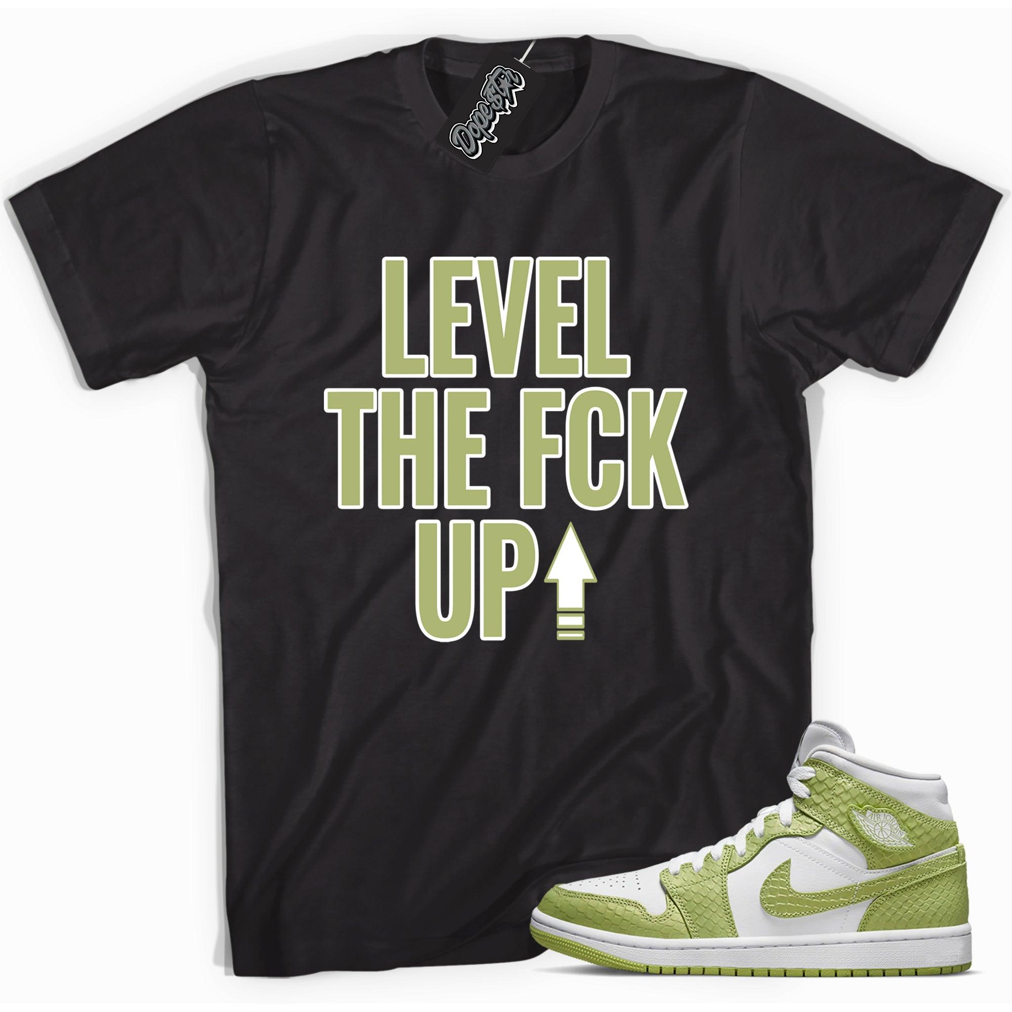 Cool black graphic tee with 'Level Up' print, that perfectly matches  Air Jordan 1 Mid Green Python sneakers.