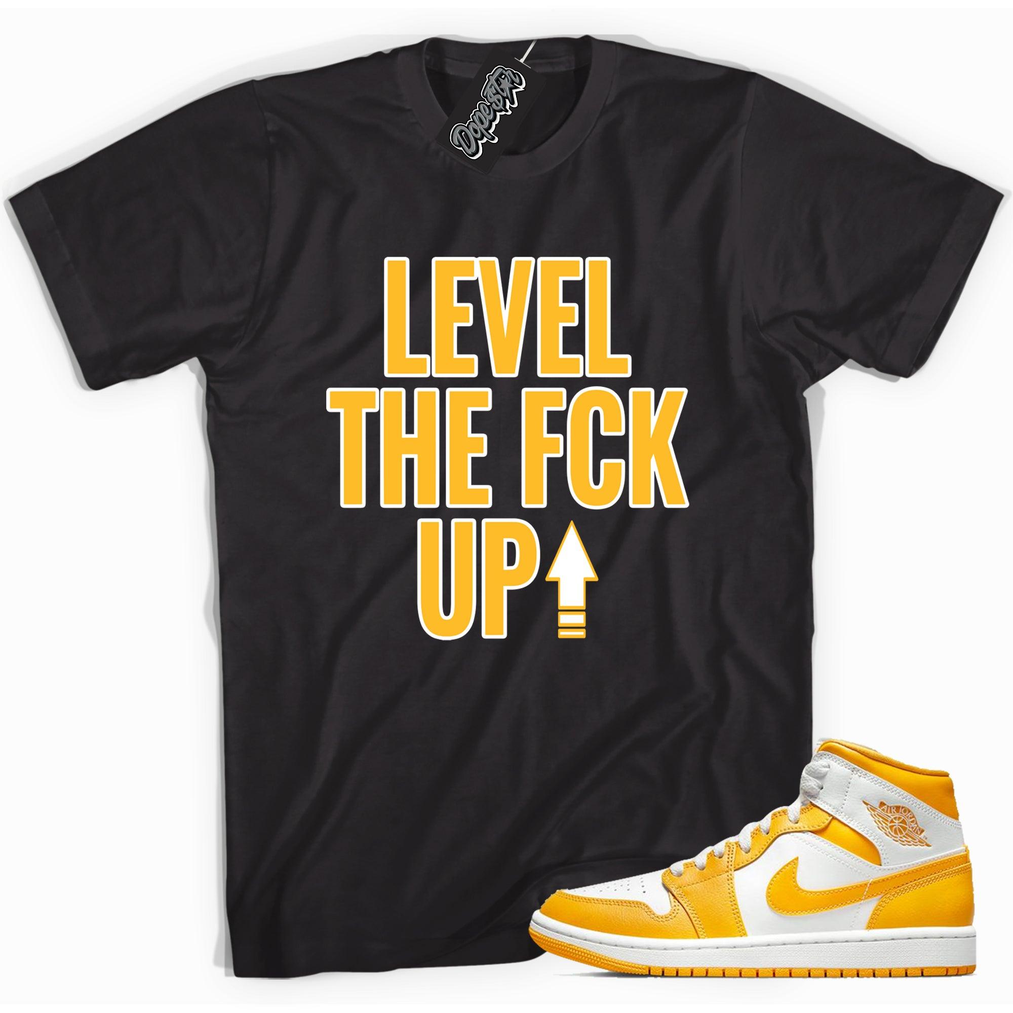 Cool black graphic tee with 'Level Up' print, that perfectly matches Air Jordan 1 Mid White University Gold sneakers.