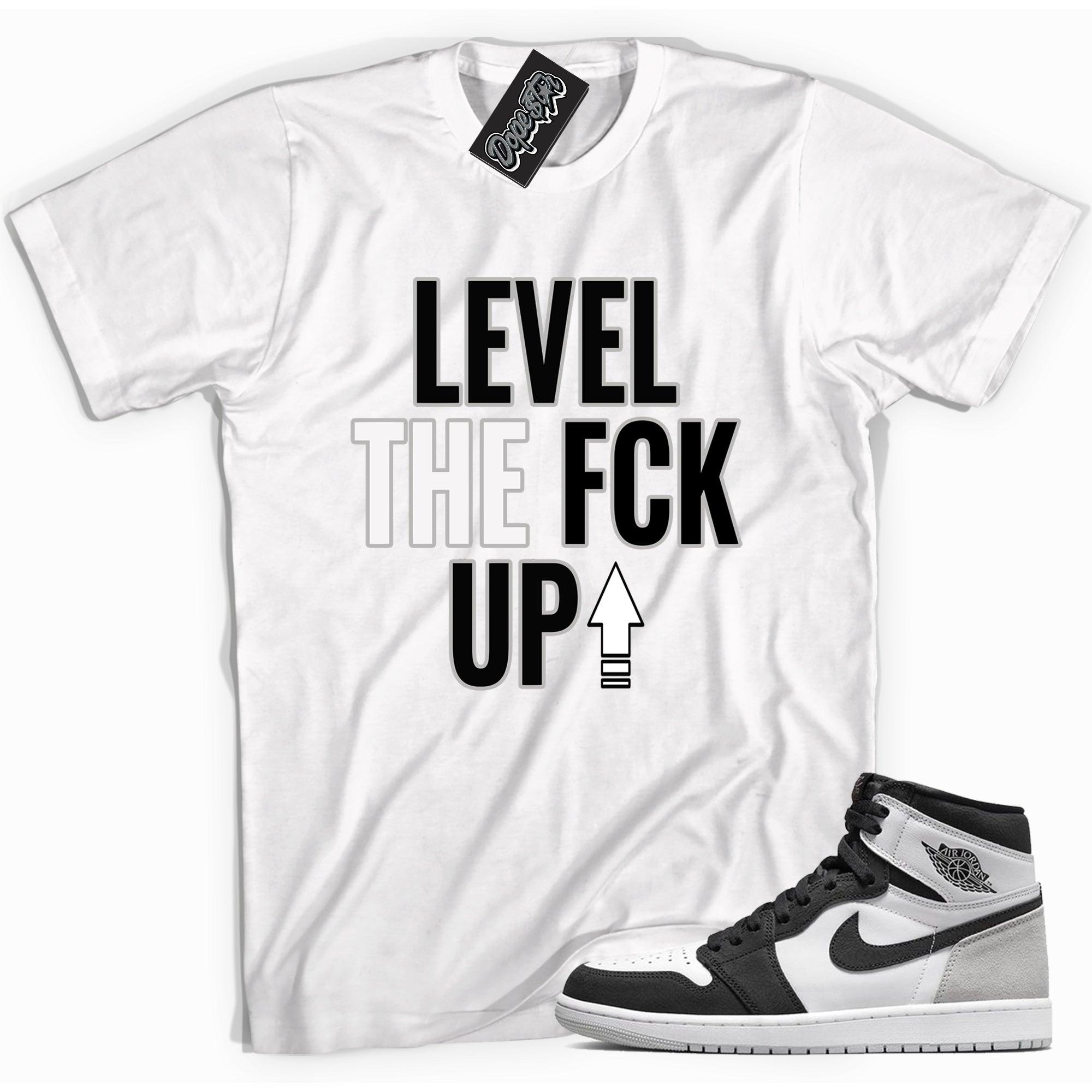 Cool white graphic tee with 'Level Up' print, that perfectly matches Air Jordan 1 Retro High OG Stage Haze sneakers.