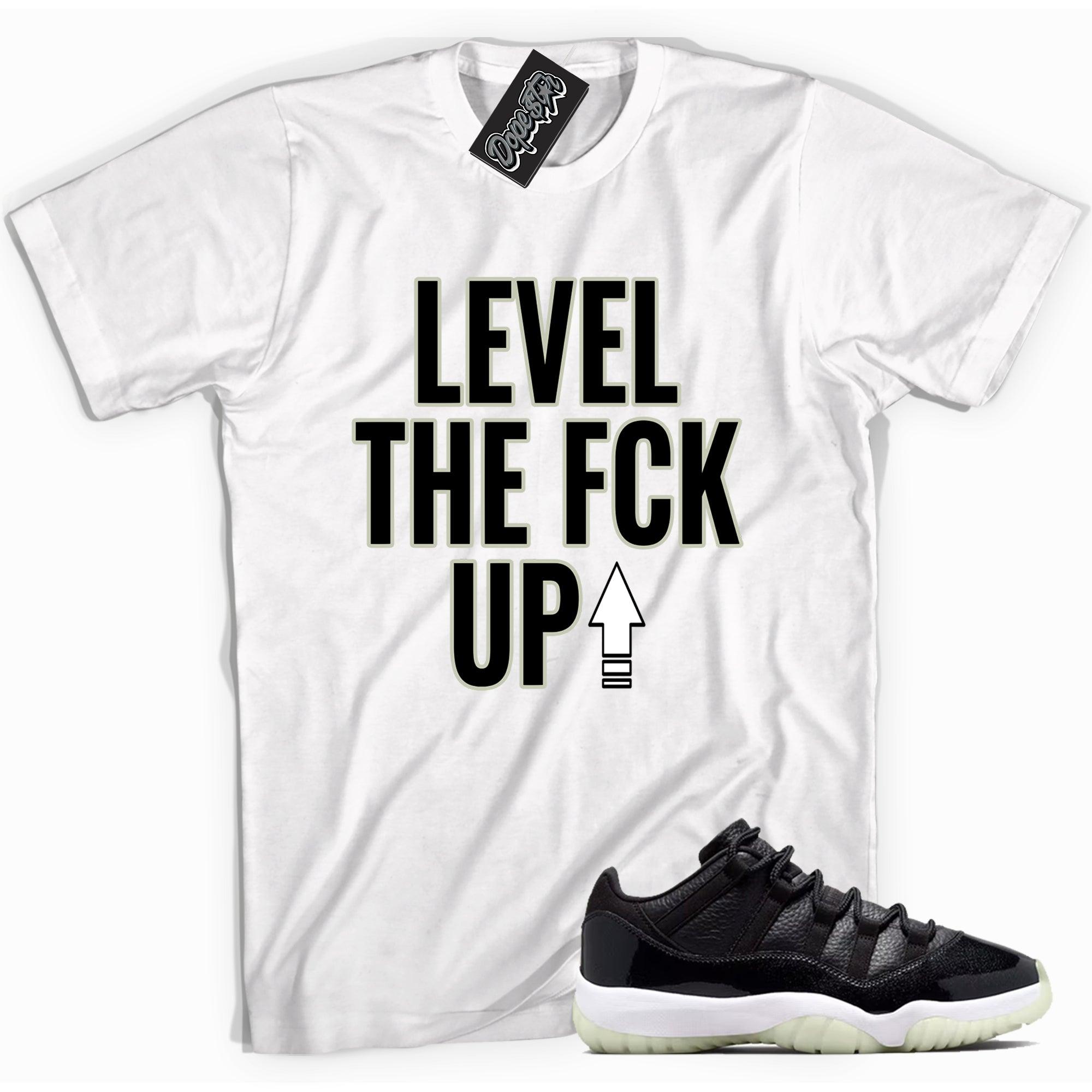 Cool white graphic tee with 'Level Up' print, that perfectly matches Air Jordan 11 Retro Low 72 10 sneakers.