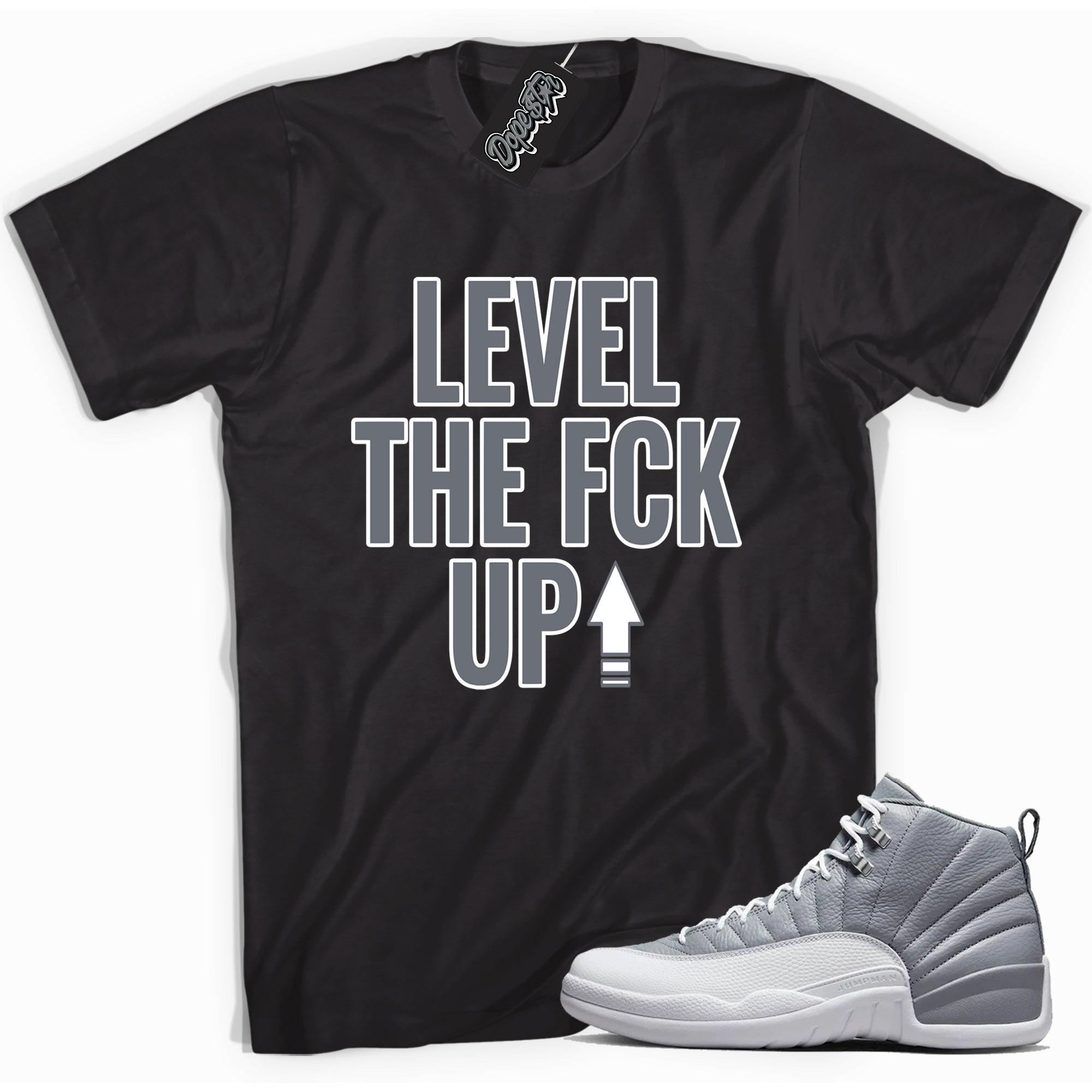 Cool black graphic tee with 'Level Up' print, that perfectly matches  Air Jordan 12 Retro Stealth sneakers.