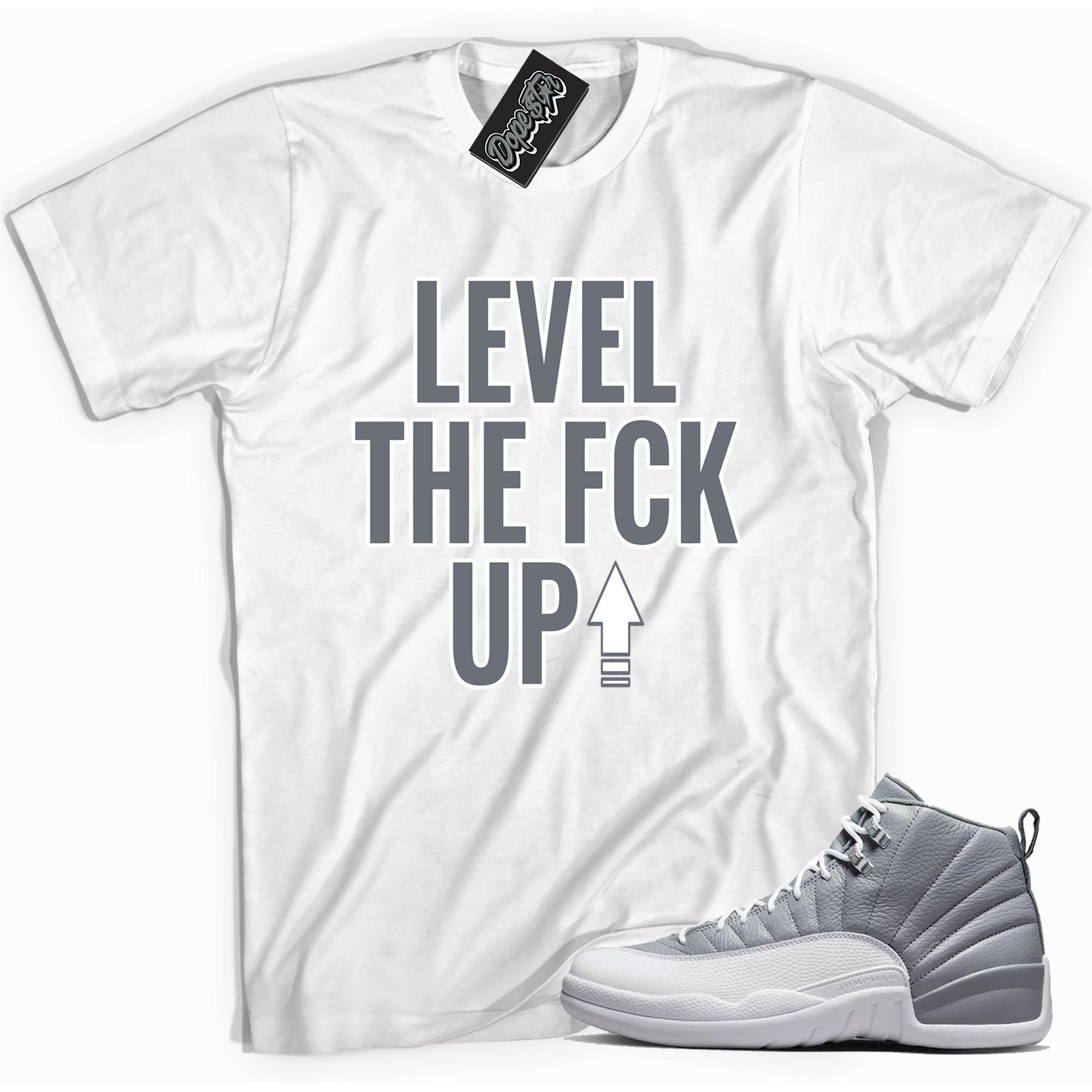 Cool white graphic tee with 'Level Up' print, that perfectly matches Air Jordan 12 Retro Stealth sneakers.