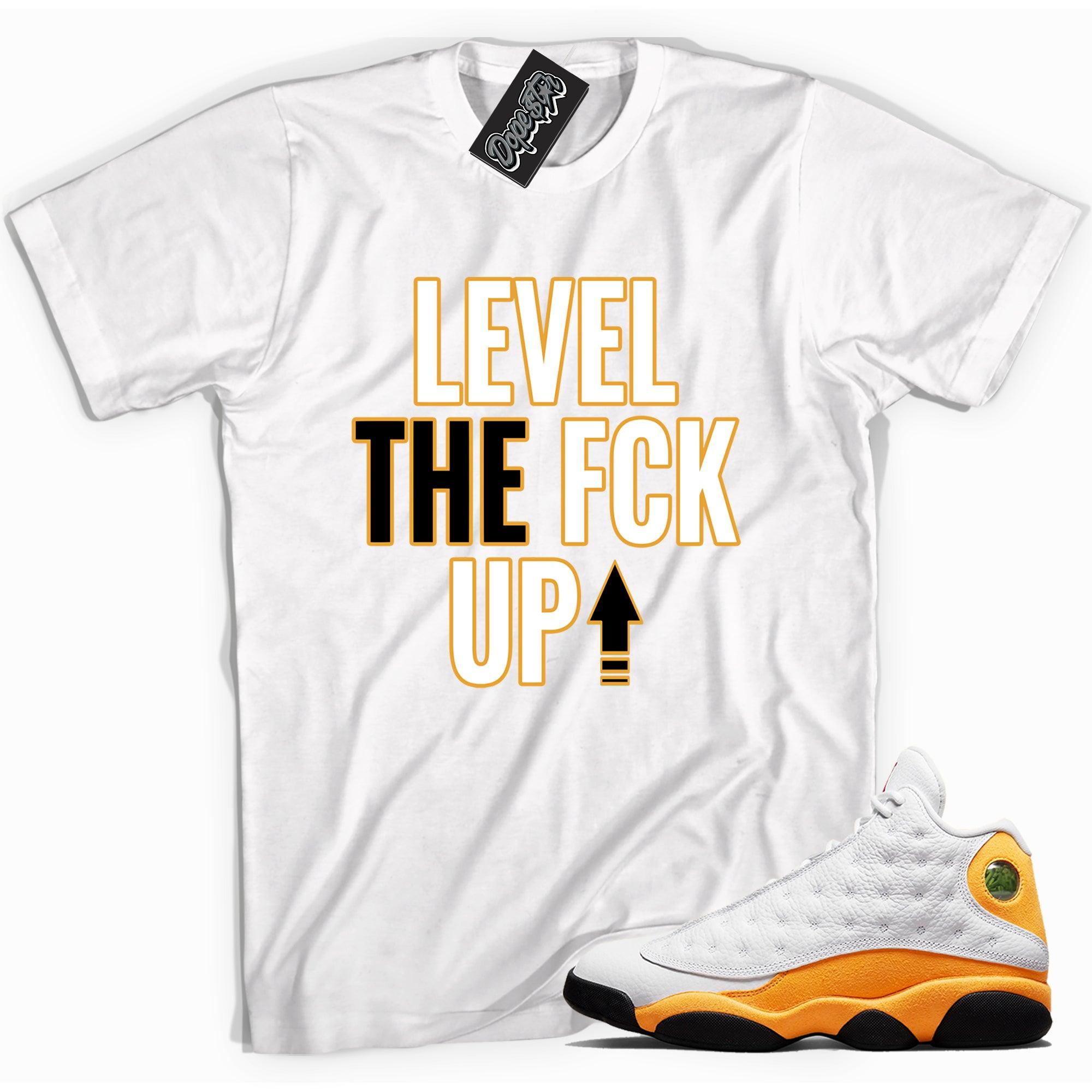Cool white graphic tee with 'Level Up' print, that perfectly matches Air Jordan 13 Retro Del Sol Toe sneakers.