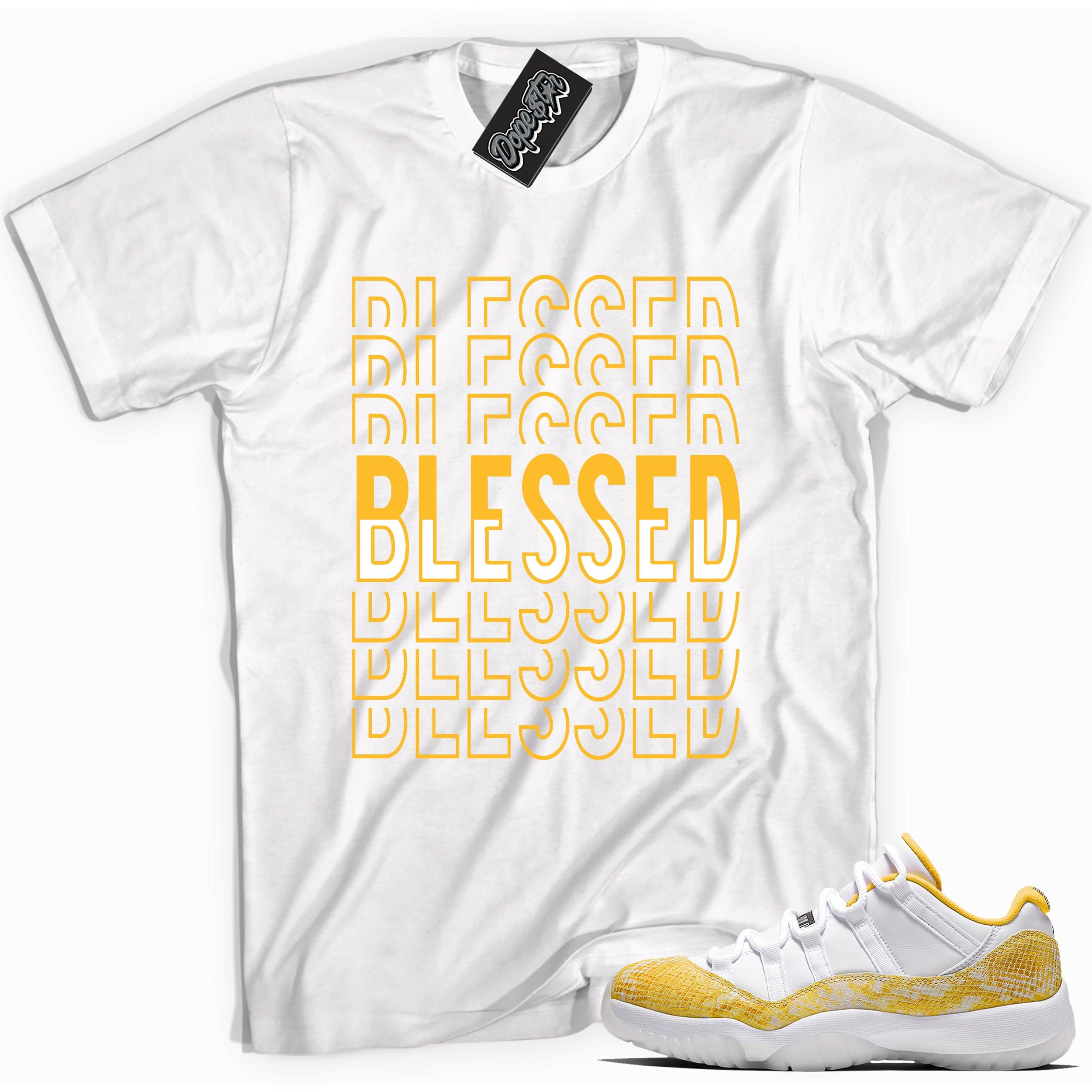 Cool white graphic tee with 'blessed' print, that perfectly matches Air Jordan 11 Low Yellow Snakeskin sneakers