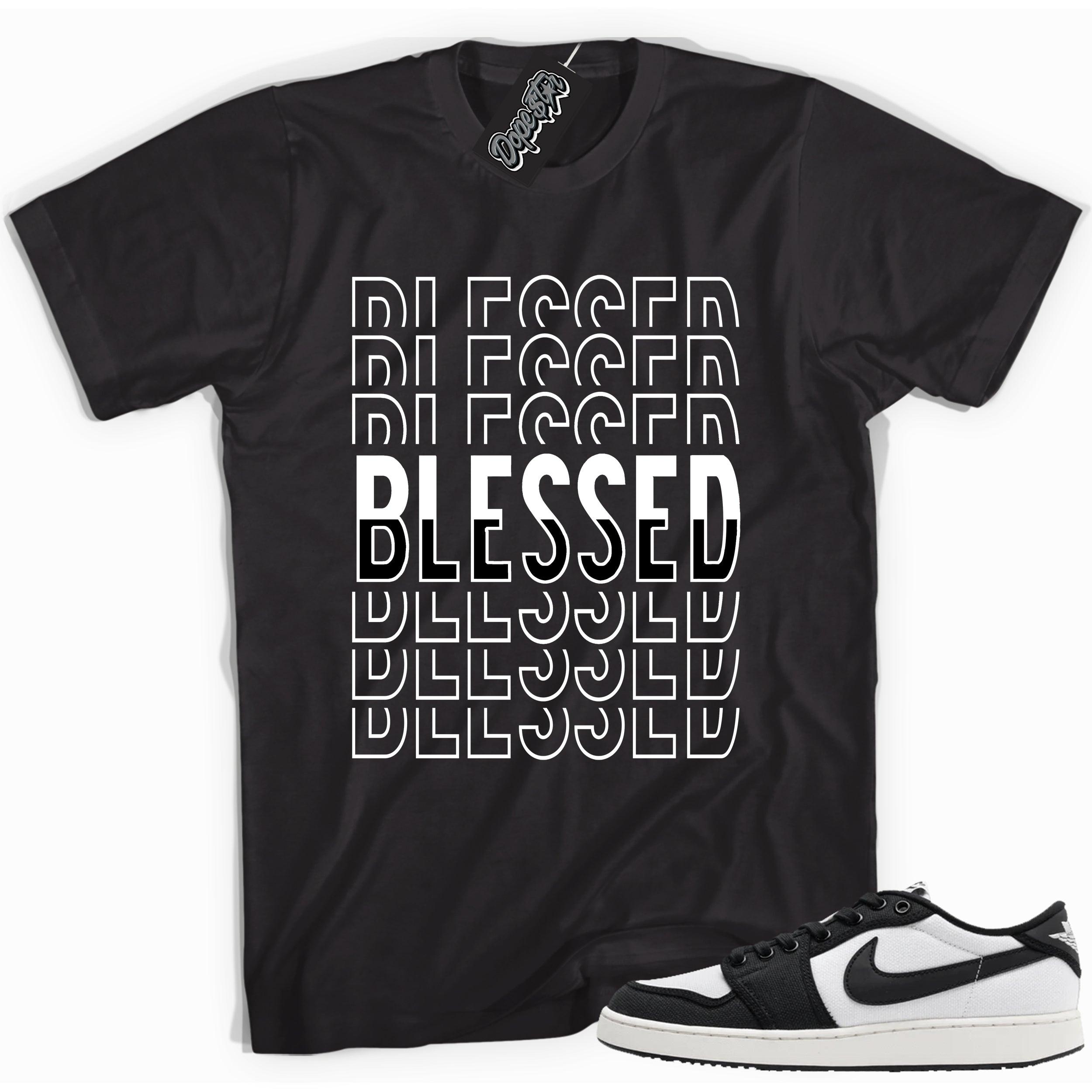 Cool black graphic tee with 'blessed' print, that perfectly matches Air Jordan 1 Retro Ajko Low Black & White sneakers.
