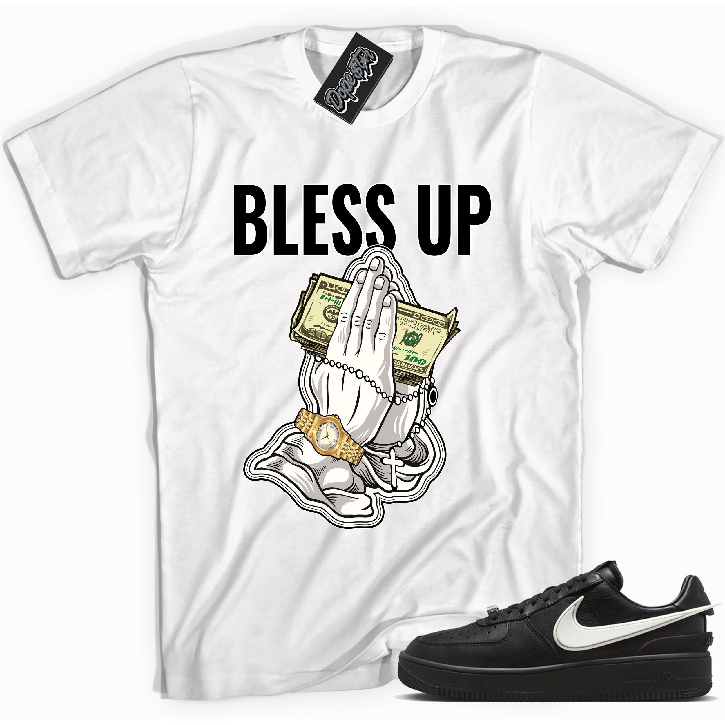 Cool white graphic tee with 'bless up' print, that perfectly matches Nike Air Force 1 Low SP Ambush Phantom sneakers.