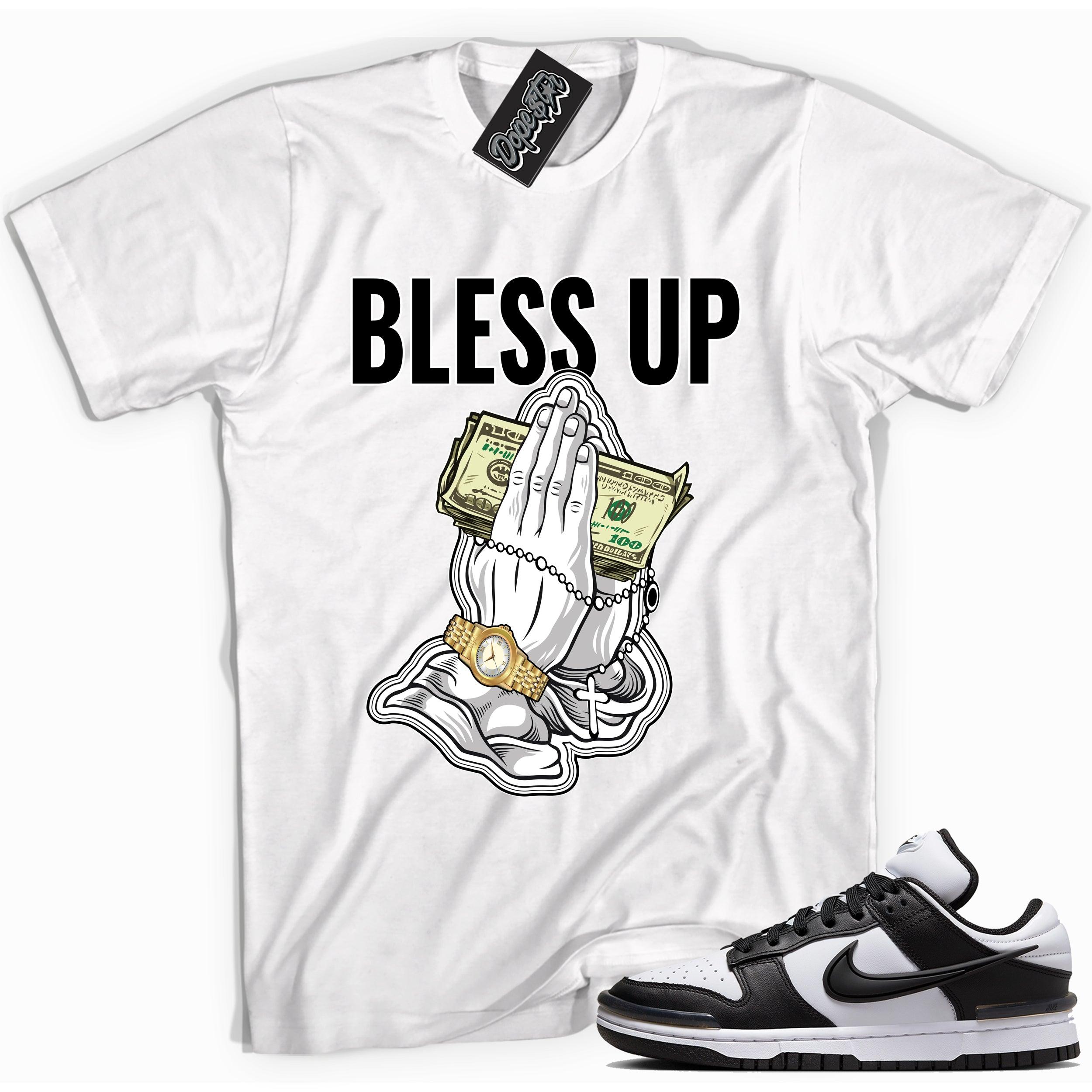 Cool white graphic tee with 'bless up' print, that perfectly matches Nike Dunk Low Twist Panda sneakers.