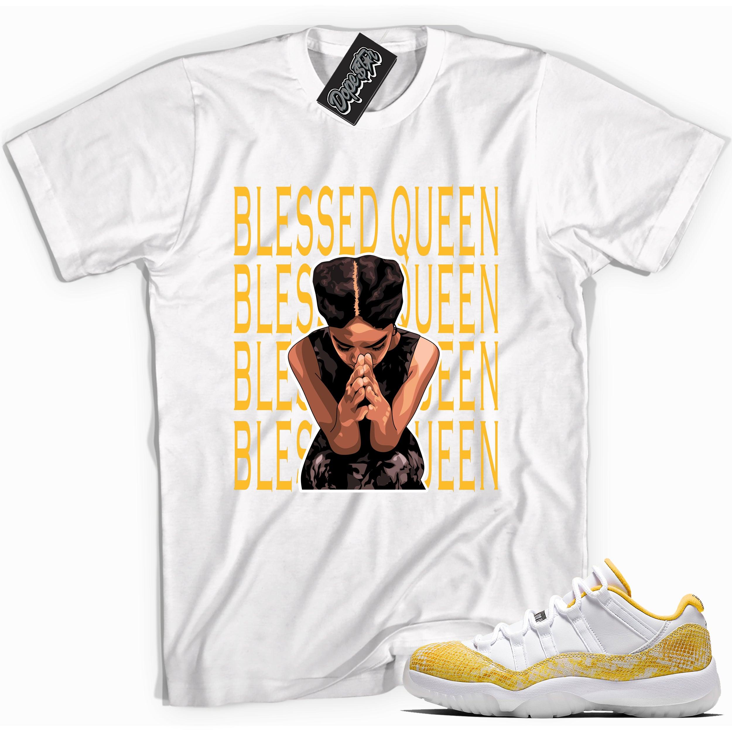 Cool white graphic tee with 'blessed queen' print, that perfectly matches Air Jordan 11 Retro Low Yellow Snakeskin sneakers