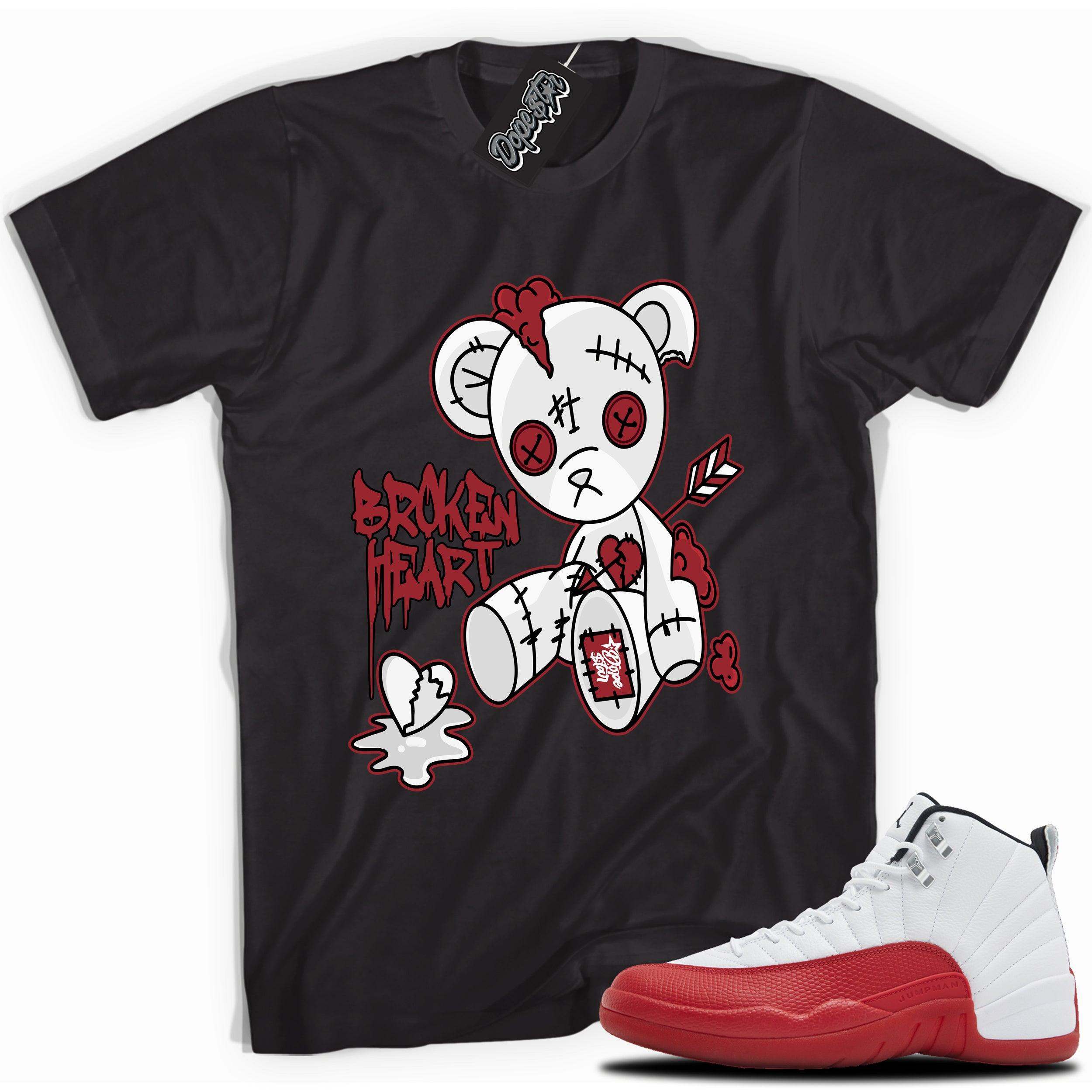 Cool Black graphic tee with “ Broken Heart Bear ” print, that perfectly matches Air Jordan 12 Retro Cherry Red 2023 red and white sneakers 