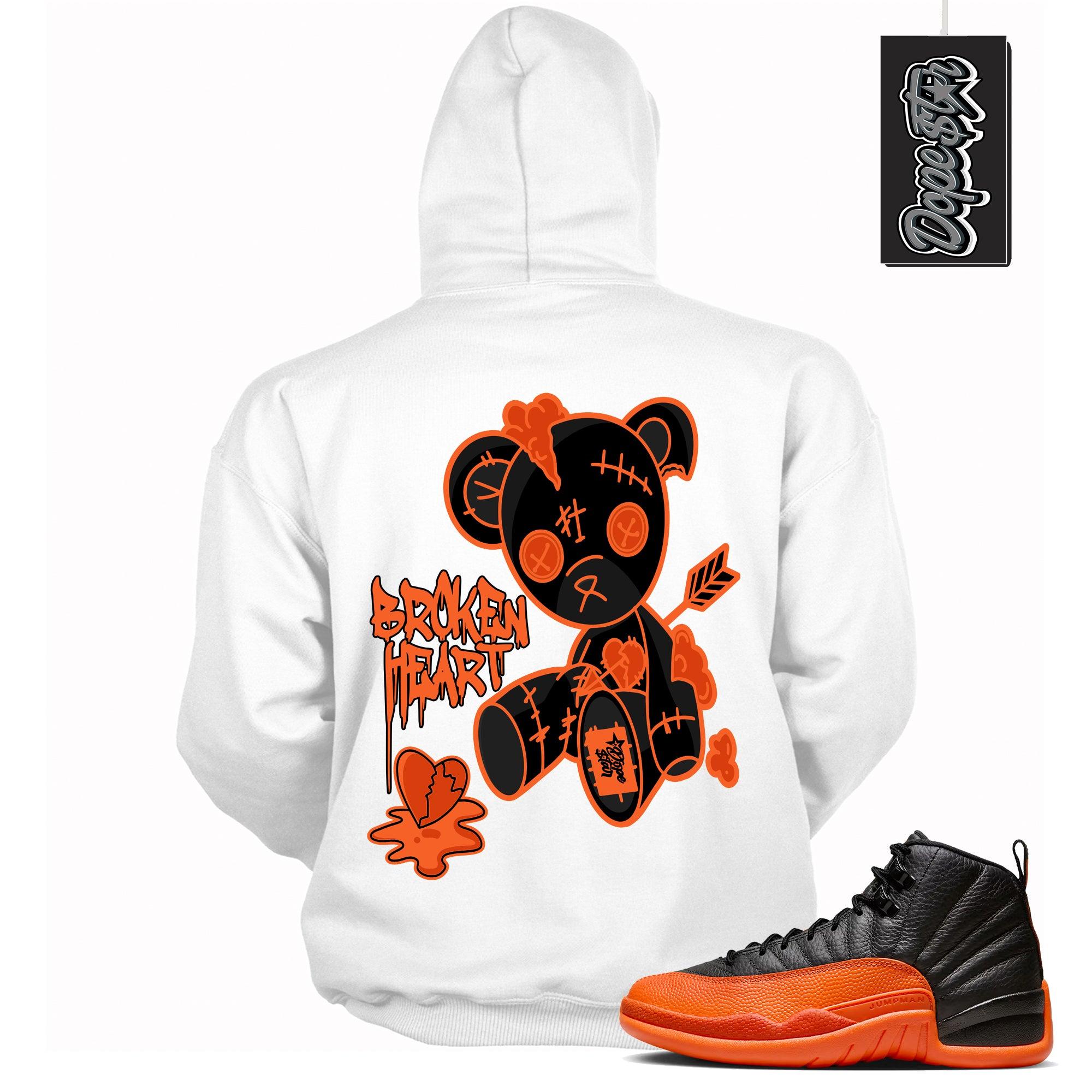 Cool White Graphic Hoodie with “ Broken Heart Bear “ print, that perfectly matches Air Jordan 12 Retro WNBA All-Star Brilliant Orange  sneakers