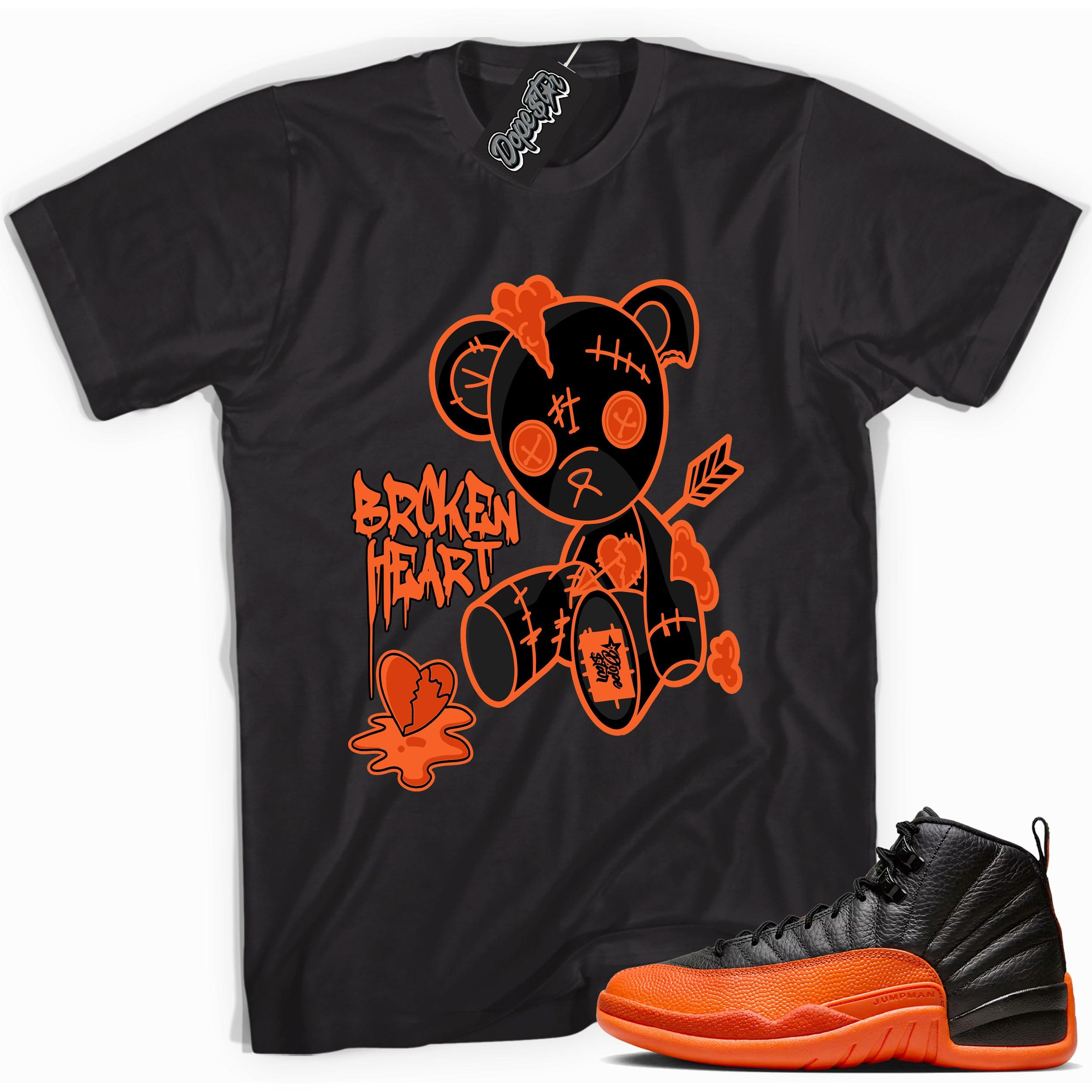 Cool Black graphic tee with “ Broken Heart Bear ” print, that perfectly matches Air Jordan 12 Retro WNBA All-Star Brilliant Orange sneakers 