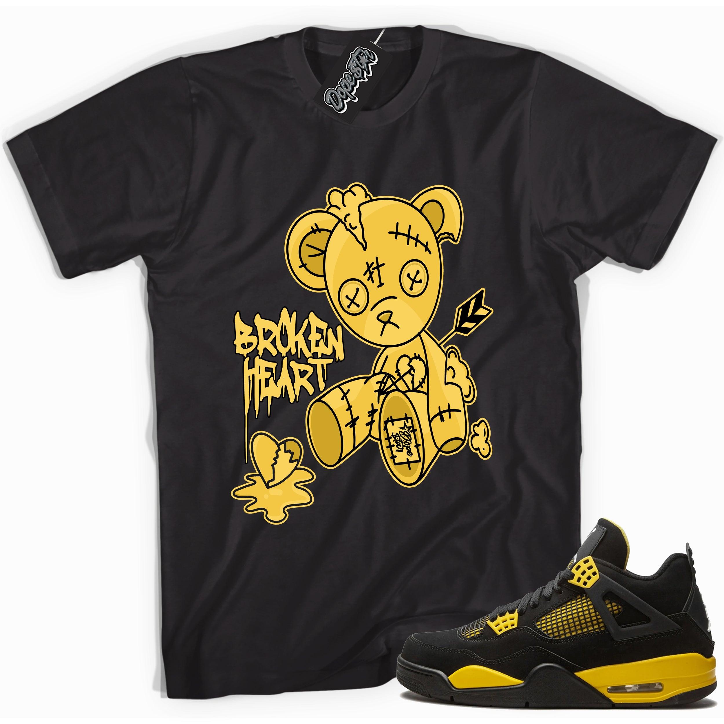 Cool black graphic tee with 'broken heart bear' print, that perfectly matches  Air Jordan 4 Thunder sneakers