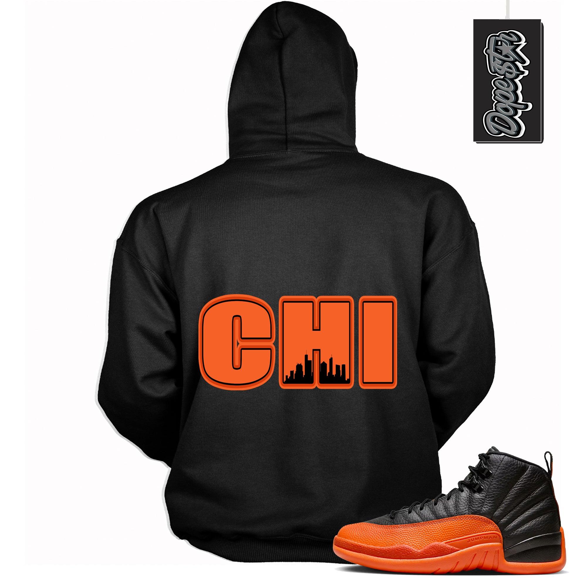 Cool Black Graphic Hoodie with “ Chicago “ print, that perfectly matches Air Jordan 12 Retro WNBA All-Star Brilliant Orange  sneakers