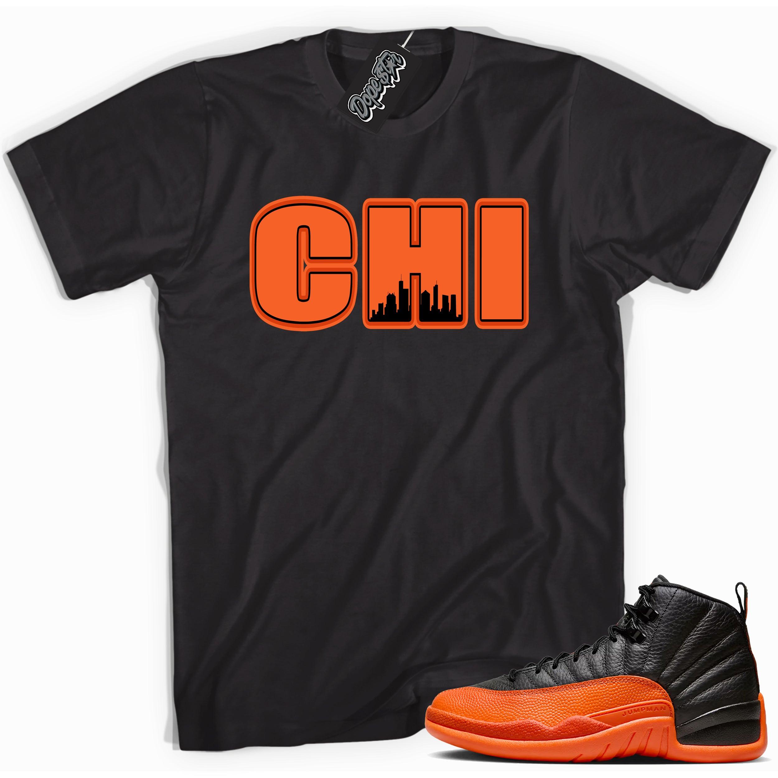 Cool Black graphic tee with “ Chicago ” print, that perfectly matches Air Jordan 12 Retro WNBA All-Star Brilliant Orange sneakers 