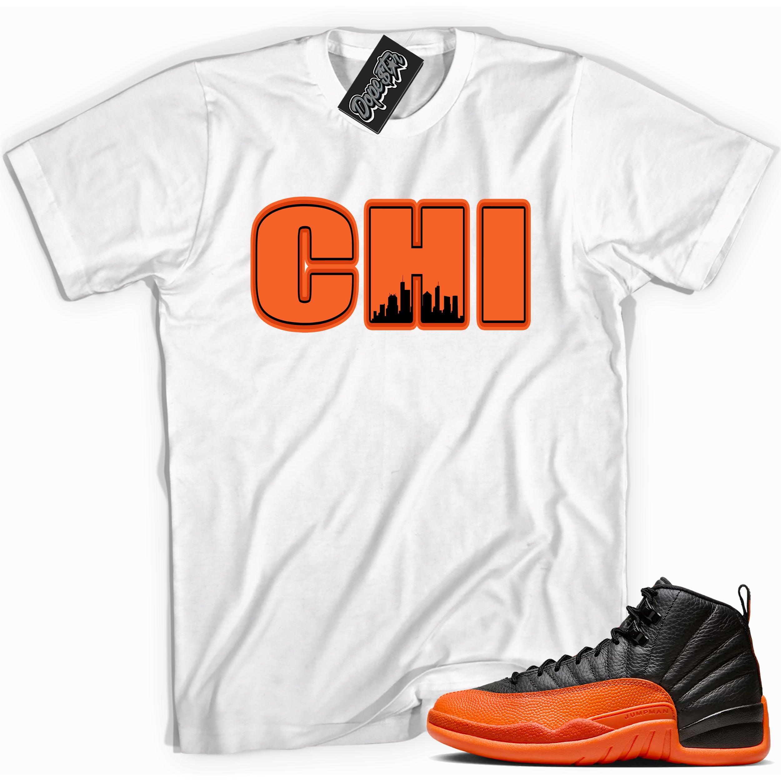 Cool White graphic tee with “ Chicago ” print, that perfectly matches Air Jordan 12 Retro WNBA All-Star Brilliant Orange sneakers 