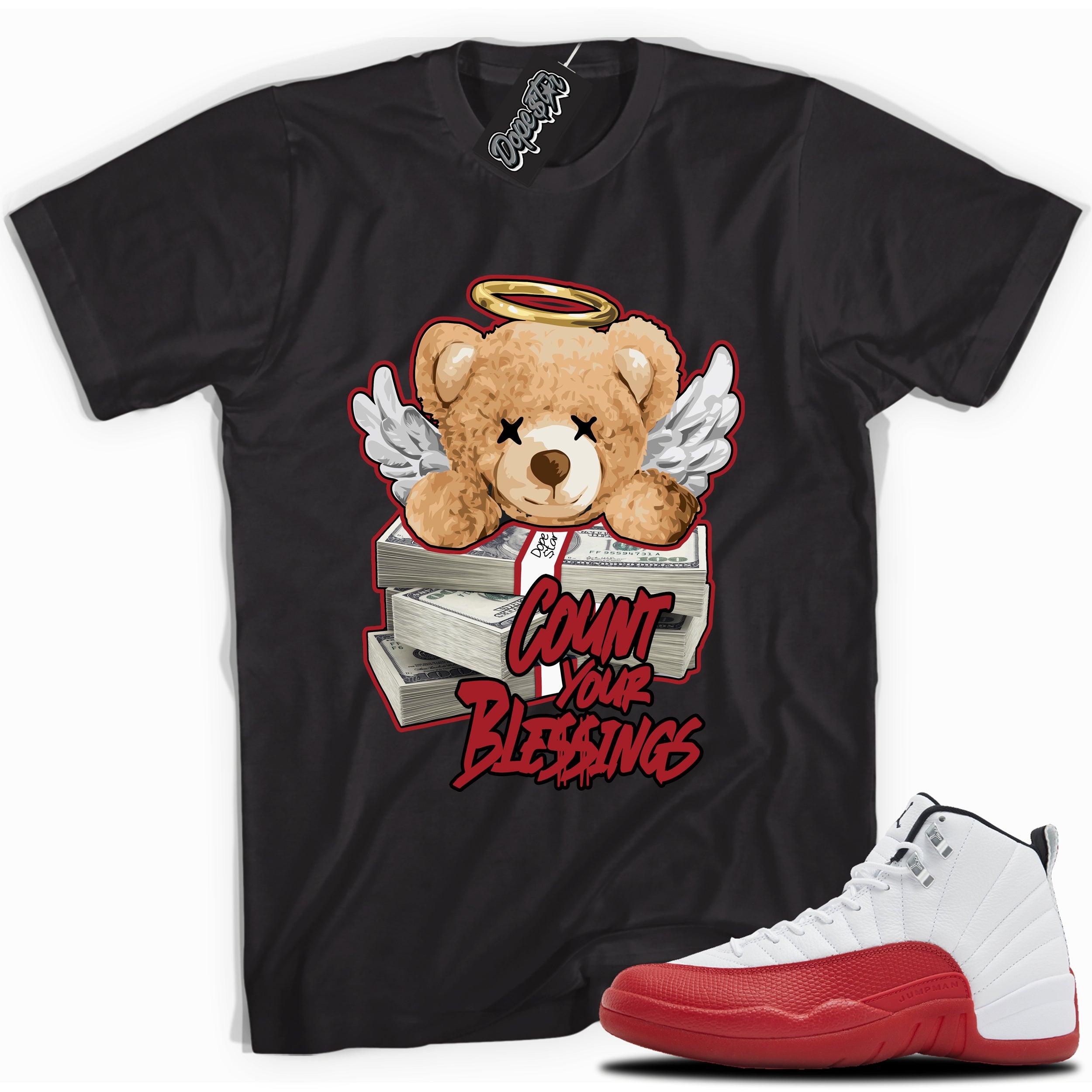 Cool Black graphic tee with “ Count Your Blessings ” print, that perfectly matches Air Jordan 12 Retro Cherry Red 2023 red and white sneakers 