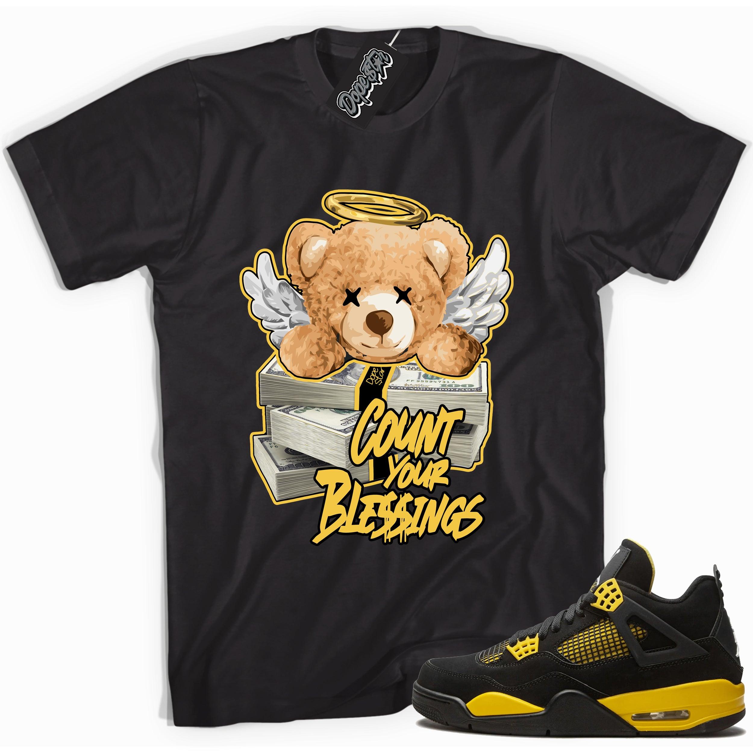 Cool black graphic tee with 'count your blessings' print, that perfectly matches  Air Jordan 4 Thunder sneakers