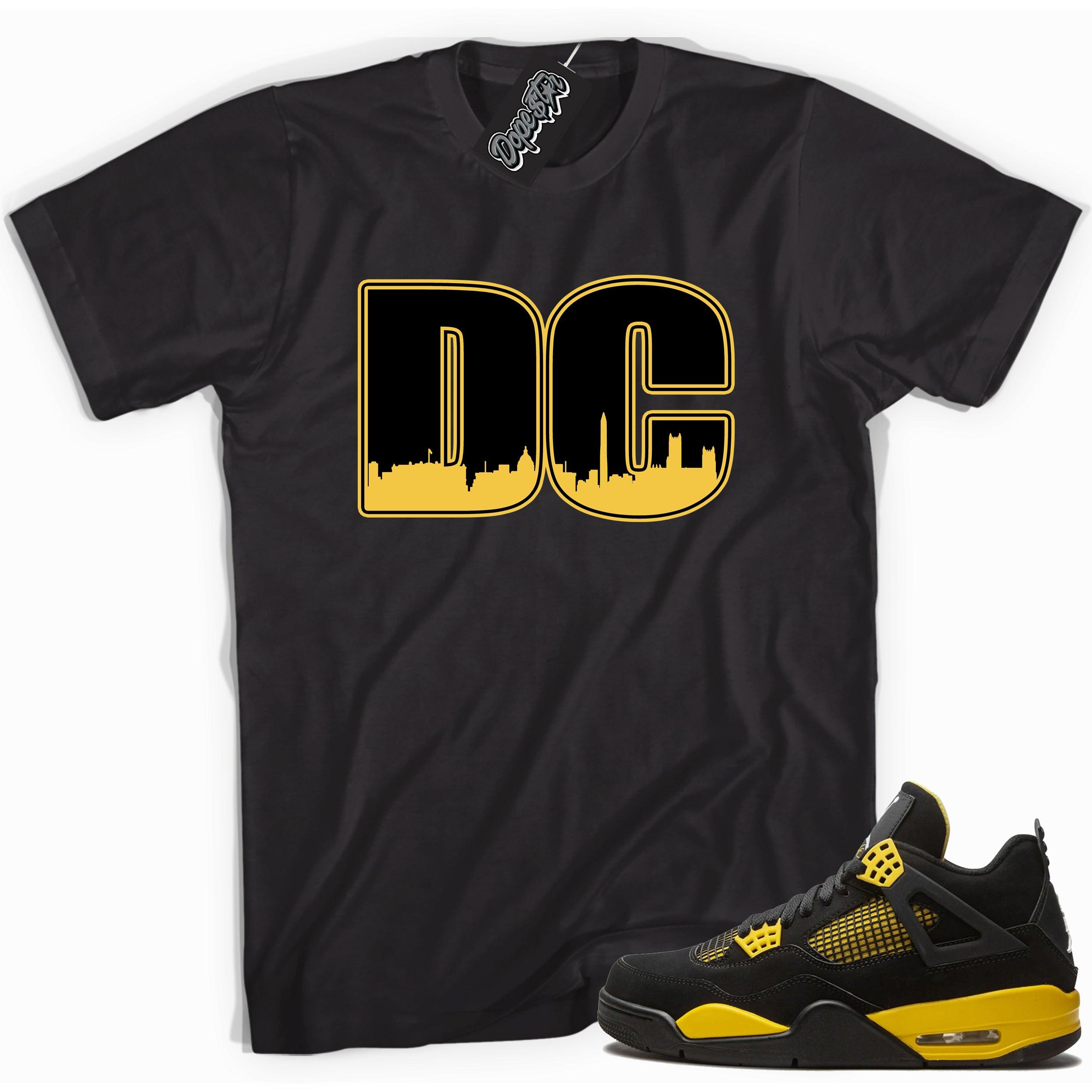 Cool black graphic tee with 'DC' print, that perfectly matches  Air Jordan 4 Thunder sneakers
