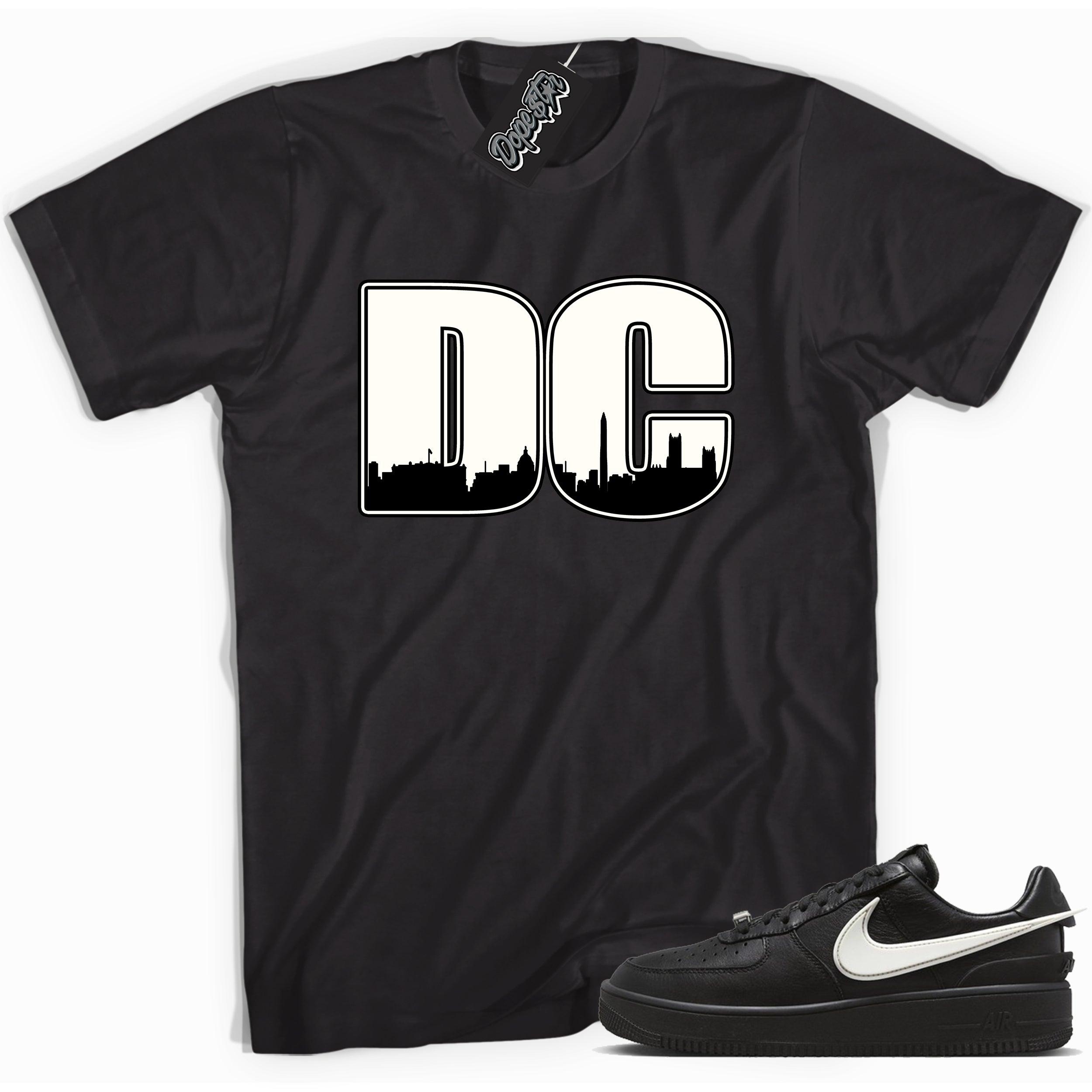 Cool black graphic tee with 'DC' print, that perfectly matches Nike Air Force 1 Low SP Ambush Phantom sneakers.