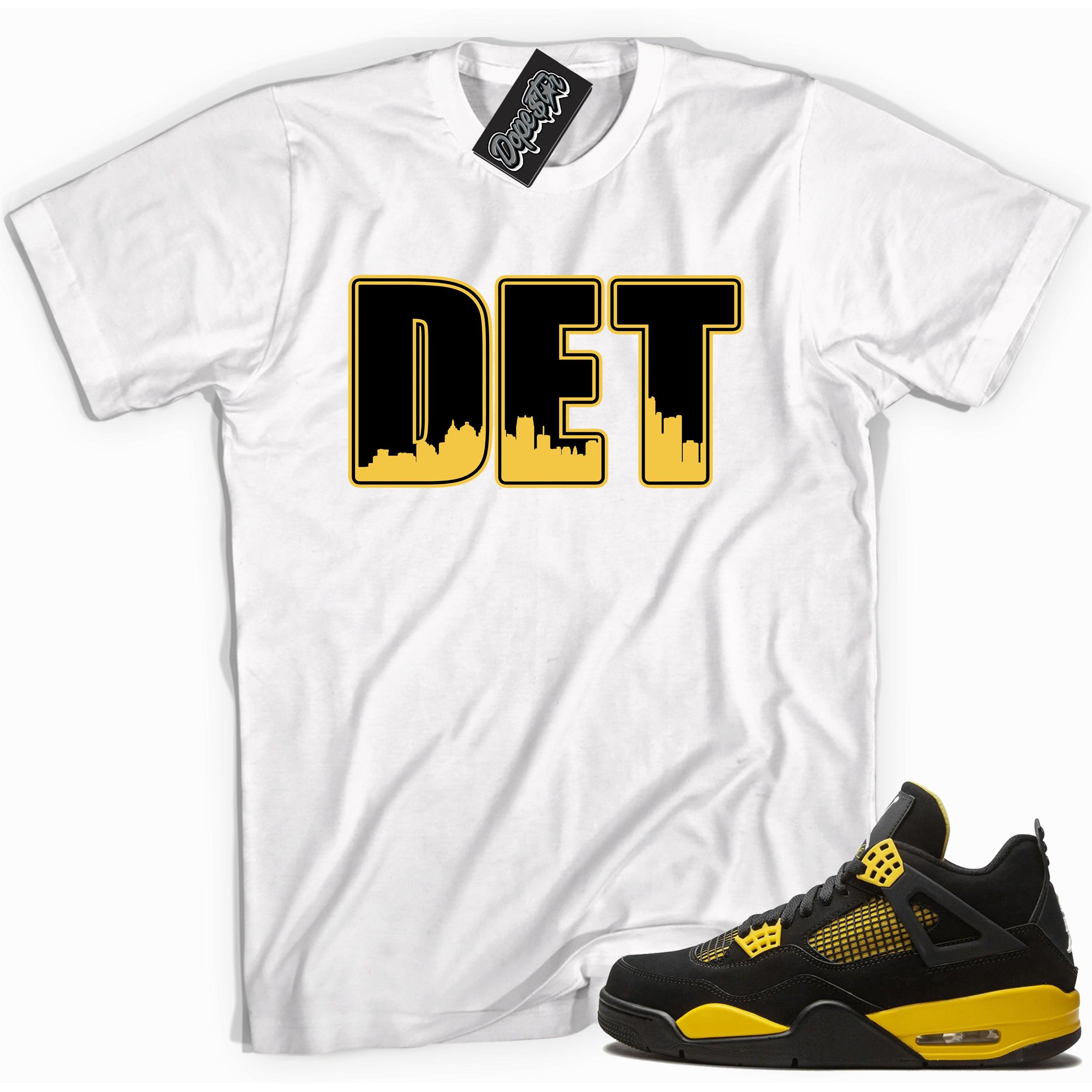 Cool white graphic tee with 'DETROIT' print, that perfectly matches Air Jordan 4 Thunder sneakers