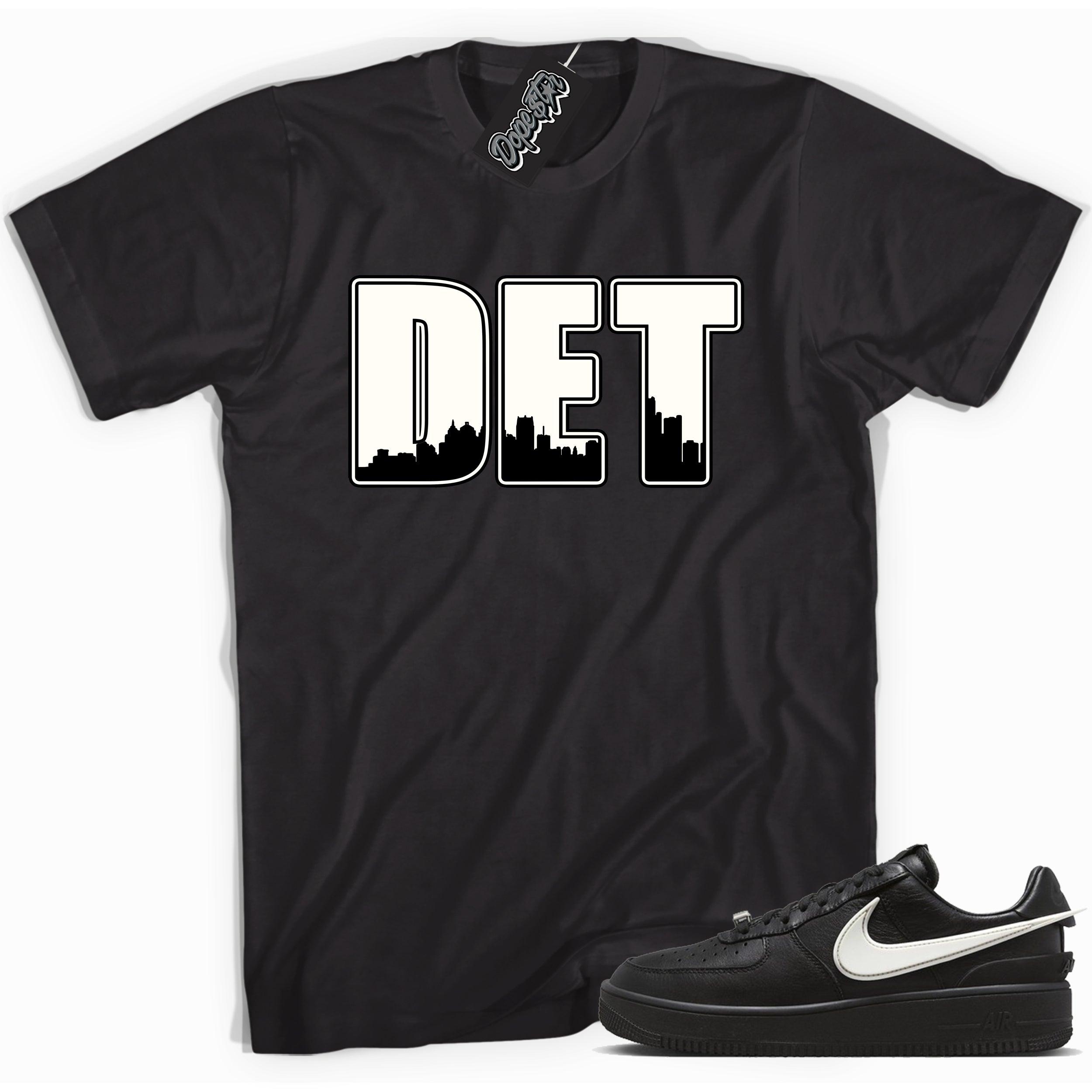 Cool black graphic tee with 'Detroit ' print, that perfectly matches Nike Air Force 1 Low SP Ambush Phantom sneakers.