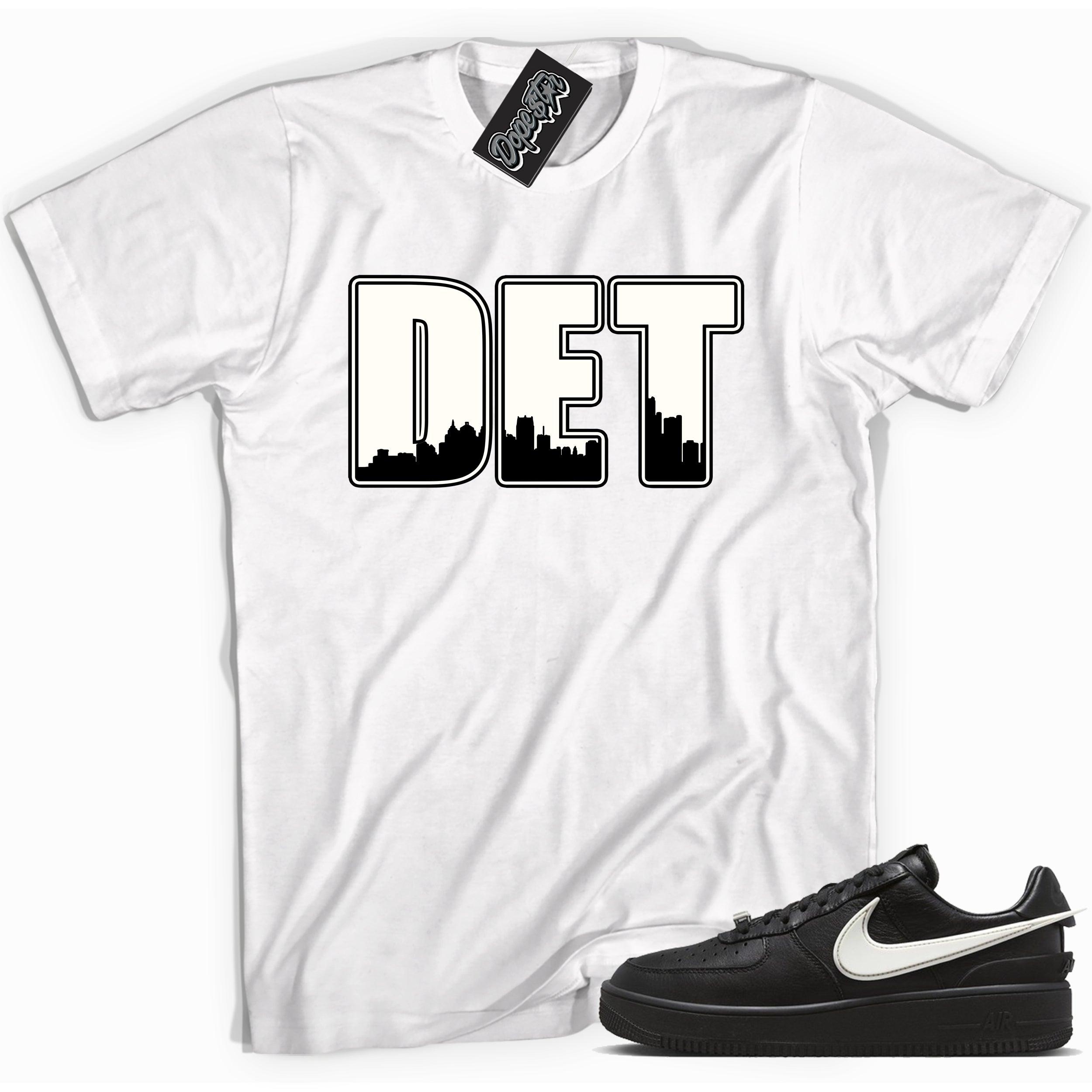 Cool white graphic tee with 'Detroit ' print, that perfectly matches Nike Air Force 1 Low SP Ambush Phantom sneakers.