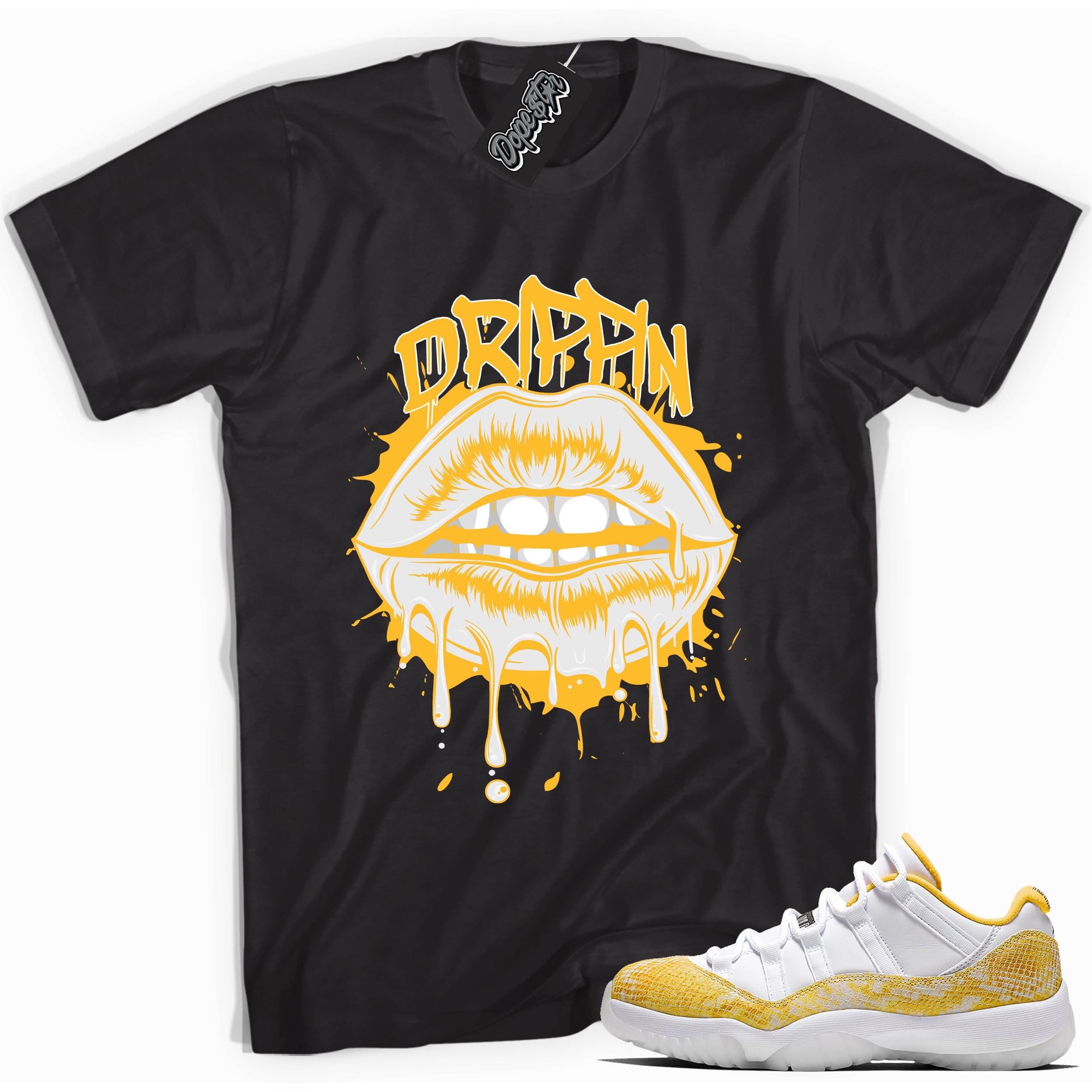 Cool black graphic tee with 'drippin' print, that perfectly matches  Air Jordan 11 Low Yellow Snakeskin sneakers
